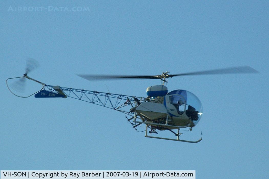 VH-SON, 1964 Bell 47G-4 C/N 3135, Bell 47G-4 Soloy [3135] Brisbane area~VH 19/03/2007. Taken through glass of moving coach whilst on the motorway.