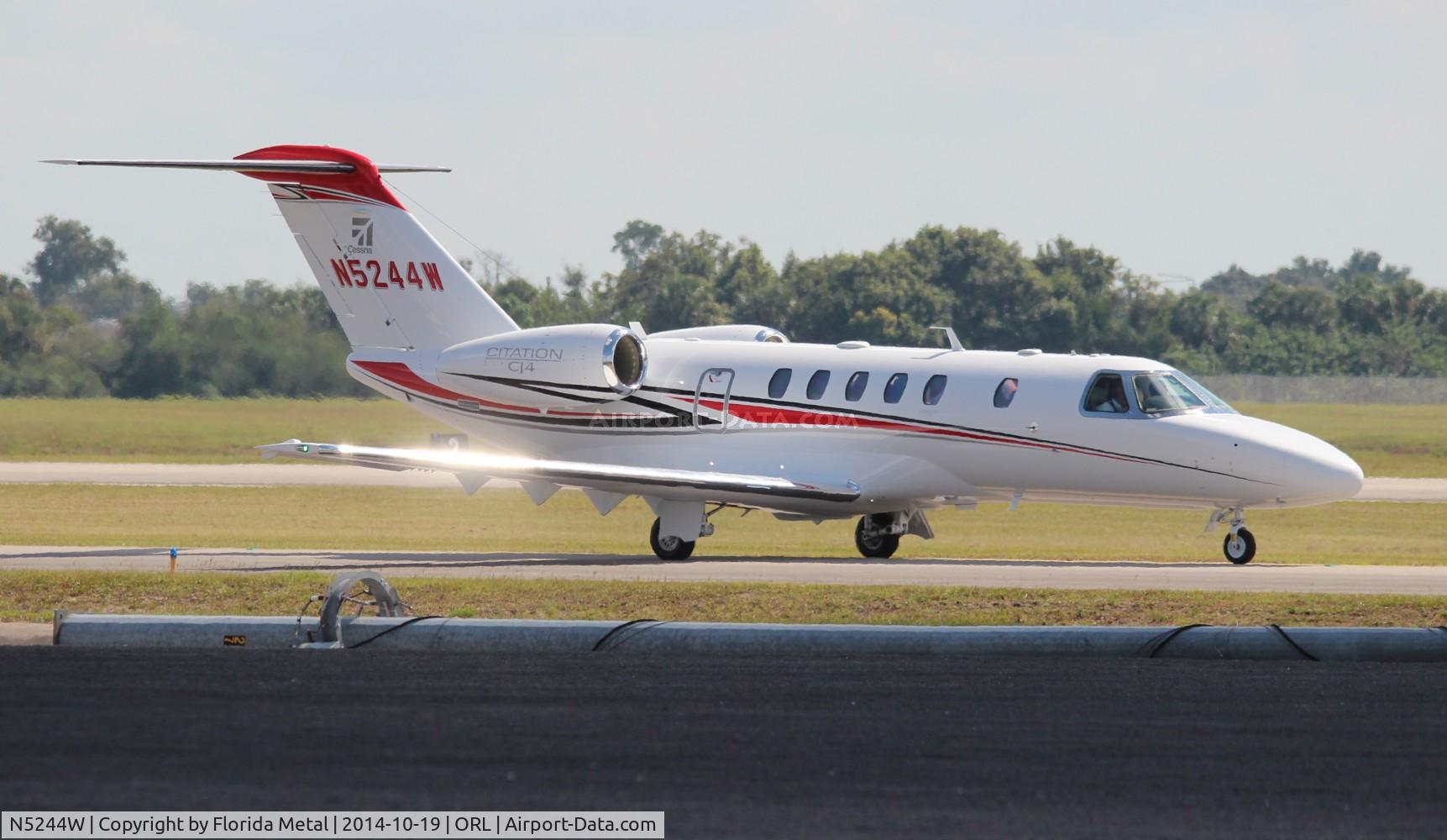 N5244W, 2014 Cessna 525C CitationJet CJ4 C/N 525C-0169, Brand new Cessna CJ4 not even in the FAA database yet in for NBAA in Orlando