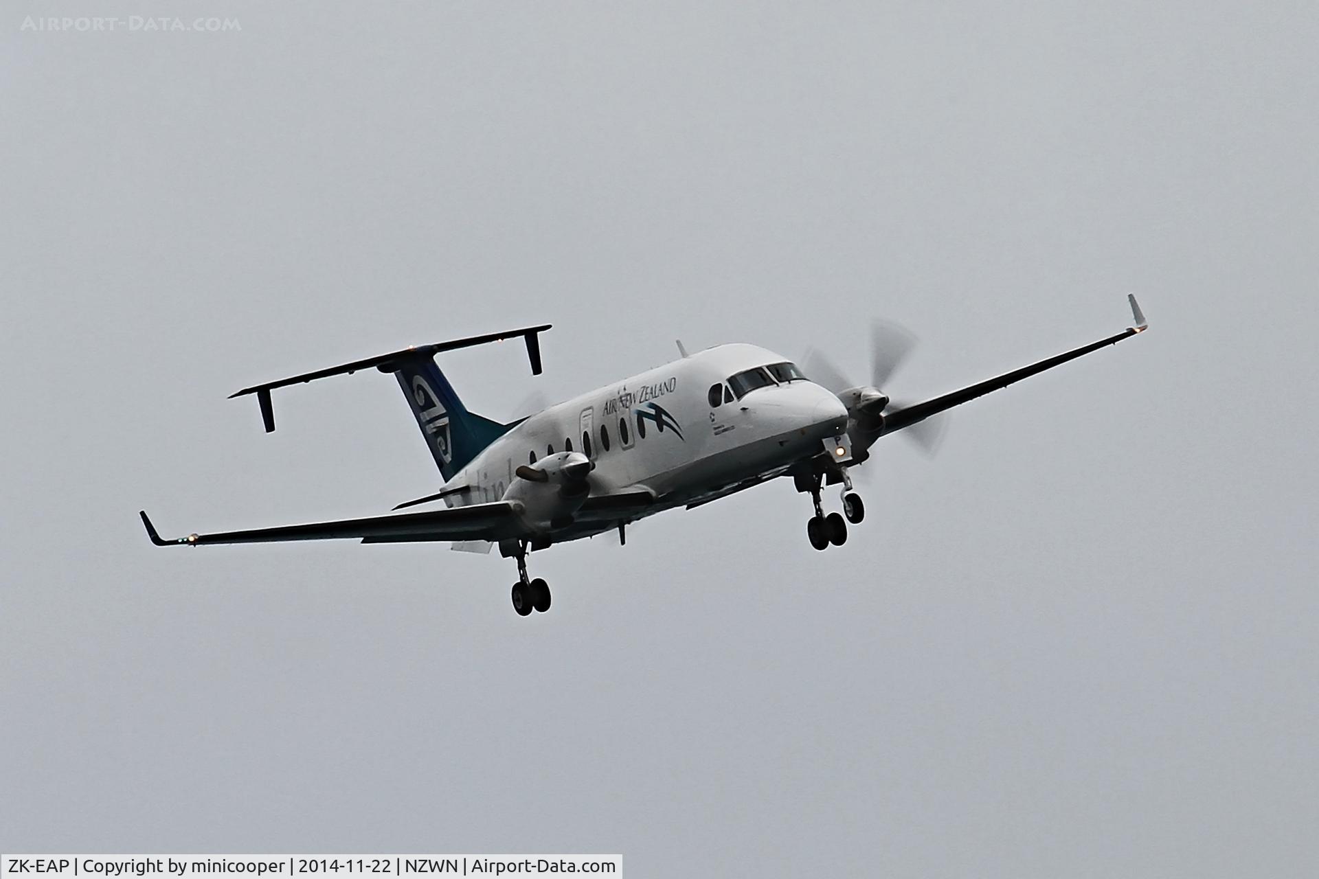 ZK-EAP, 2002 Raytheon 1900D C/N UE-439, Landing in a gusting northerly