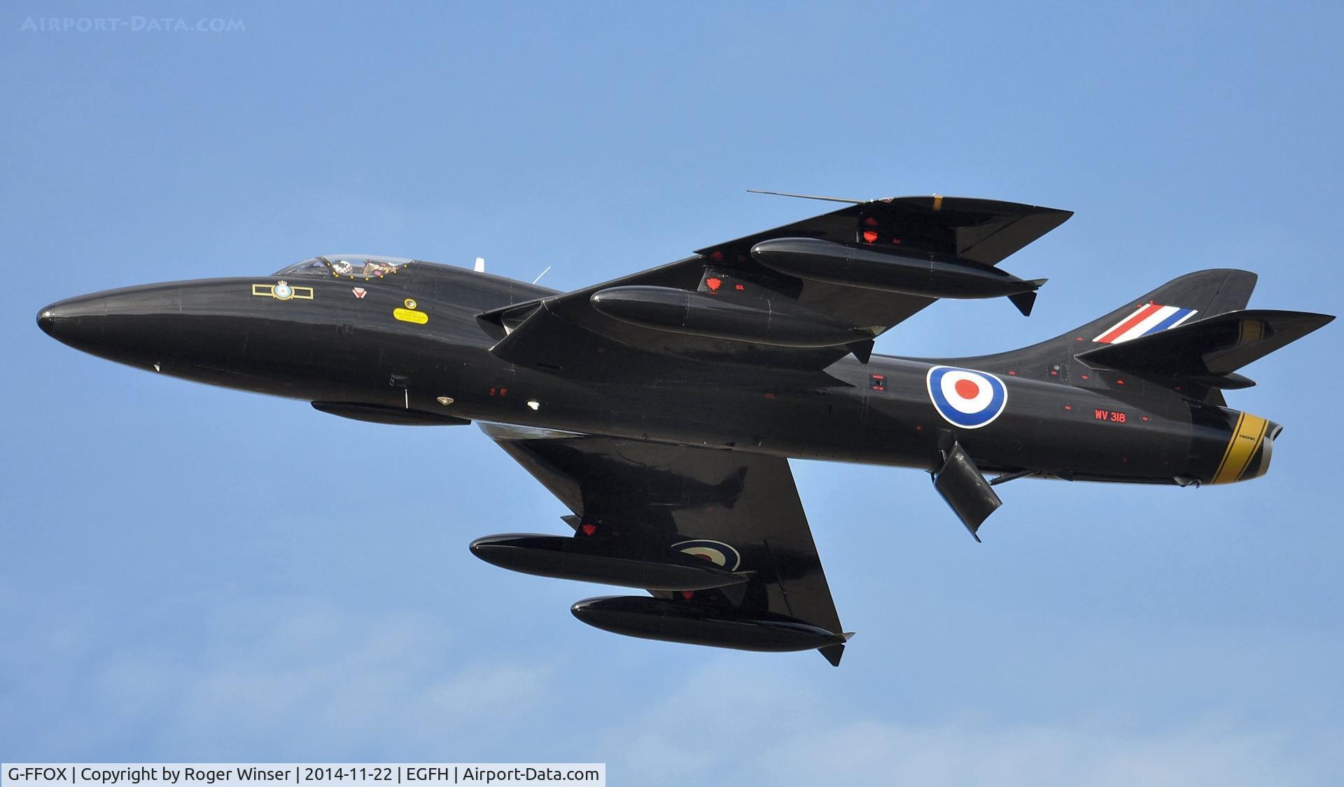 G-FFOX, 1955 Hawker Hunter T.7B C/N 41H-670792, Flypast by ex-RAF Hawker Hunter T.7A WV318 in the 'Black Arrows' colour scheme carried by 111 Squadron RAF aircraft between 1956 and 1960. Based at Cranfield Airport, Bedfordshire. Recently fitted with two additional underwing fuel tanks.