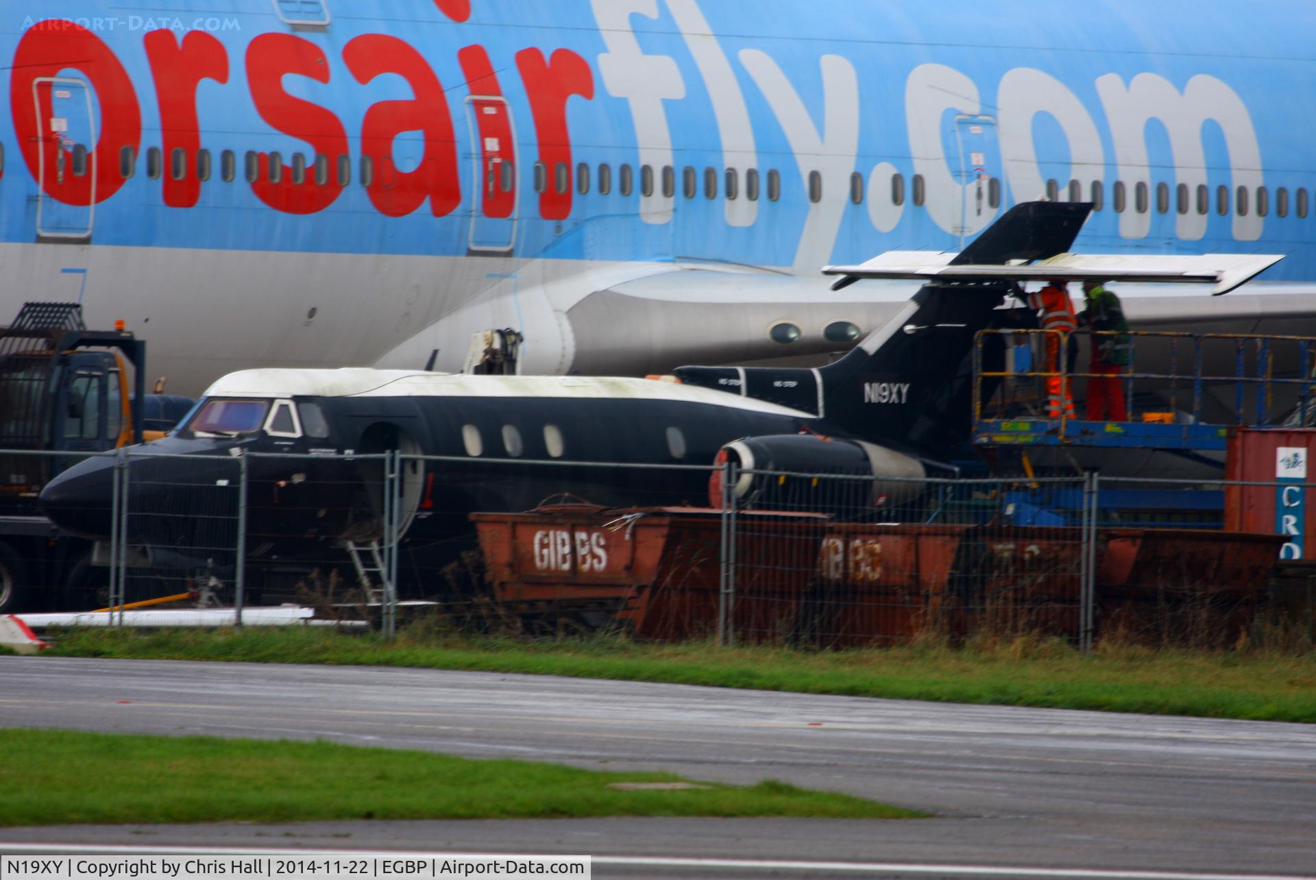 N19XY, 1966 Hawker Siddeley HS.125 Dominie T.1 C/N 25055, in the scrapping area at Kemble