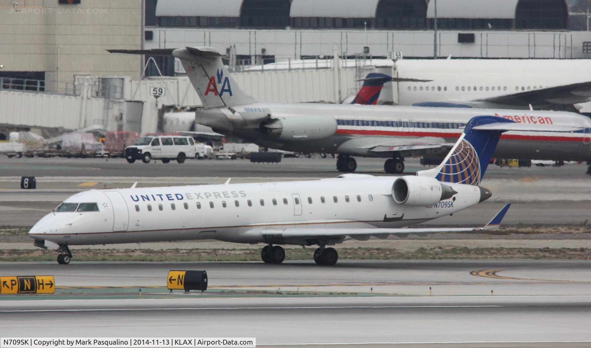 N709SK, 2004 Bombardier CRJ-701ER (CL-600-2C10) Regional Jet C/N 10159, CL-600-2C10