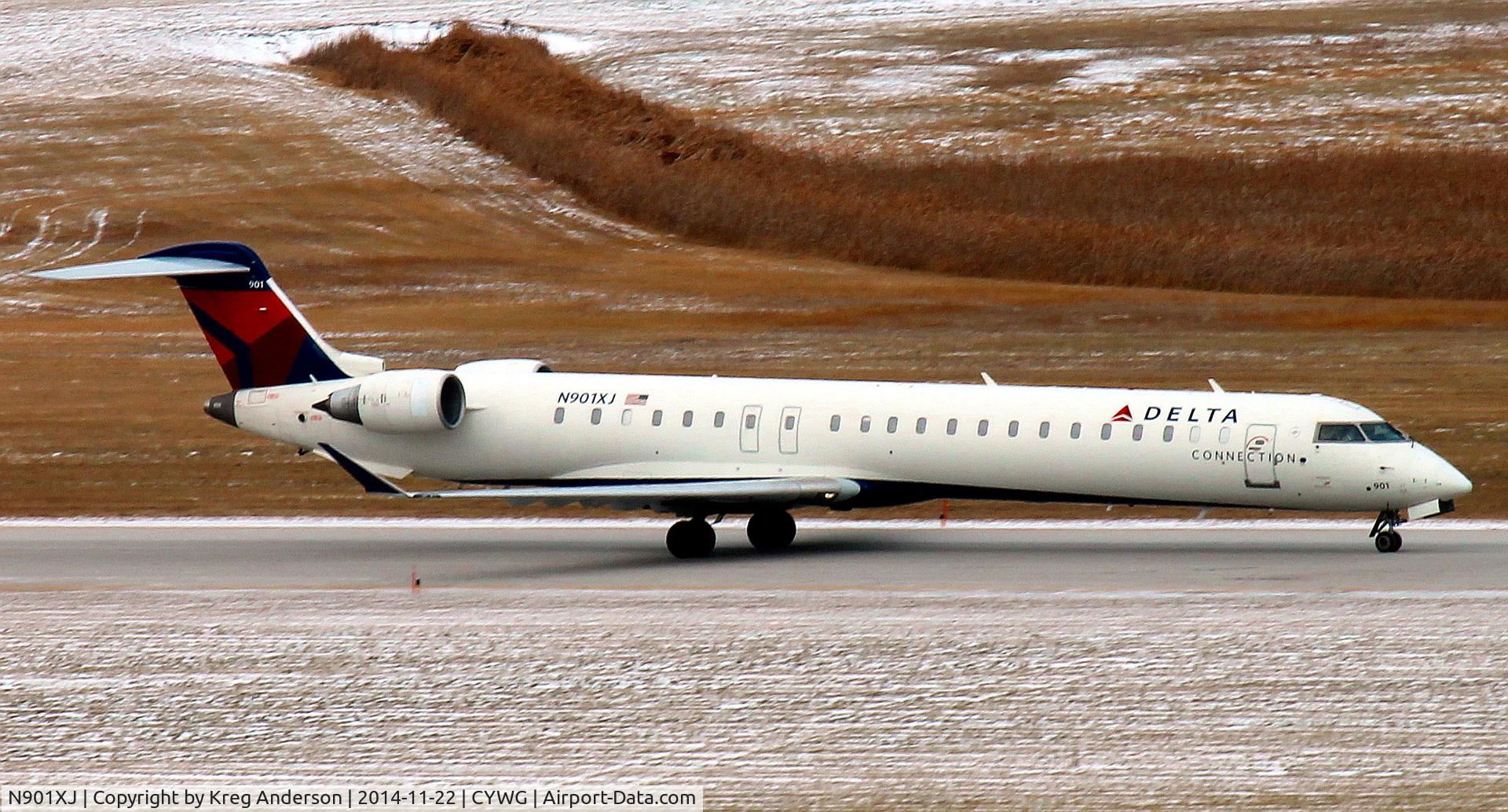 N901XJ, 2007 Bombardier CRJ-900ER (CL-600-2D24) C/N 15130, Delta Connection Bombardier CRJ-900 taxiing in after landing in Winnipeg, MB.