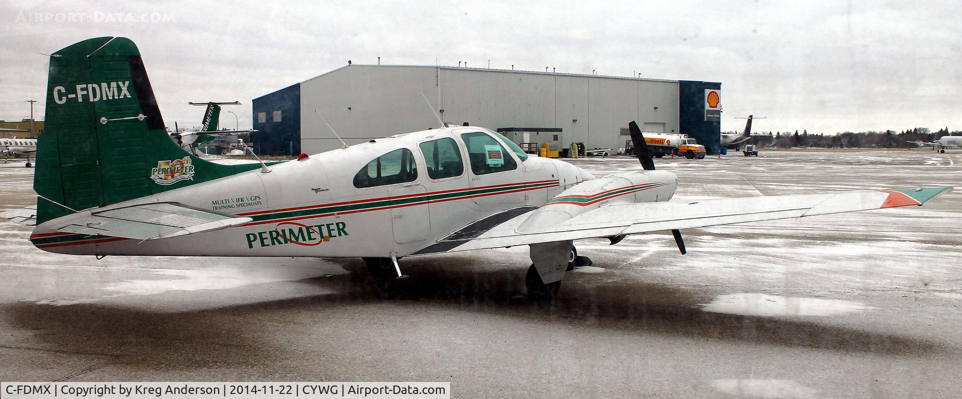 C-FDMX, 1964 Beech D95A Travel Air C/N TD-587, Perimeter Aviation Beech D95A Travel Air on the ramp.