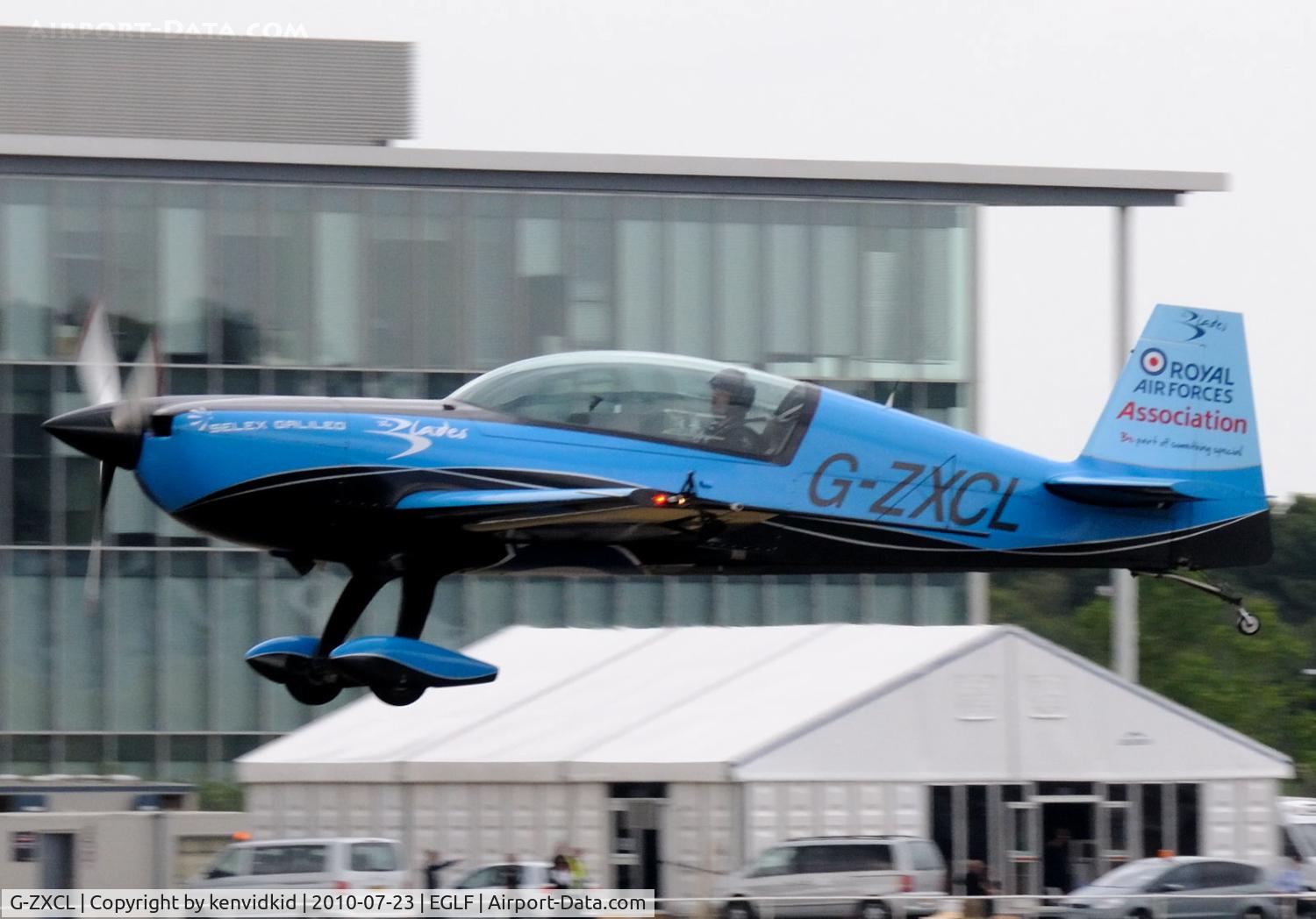 G-ZXCL, 2006 Extra EA-300L C/N 1223, Blades landing after their display.