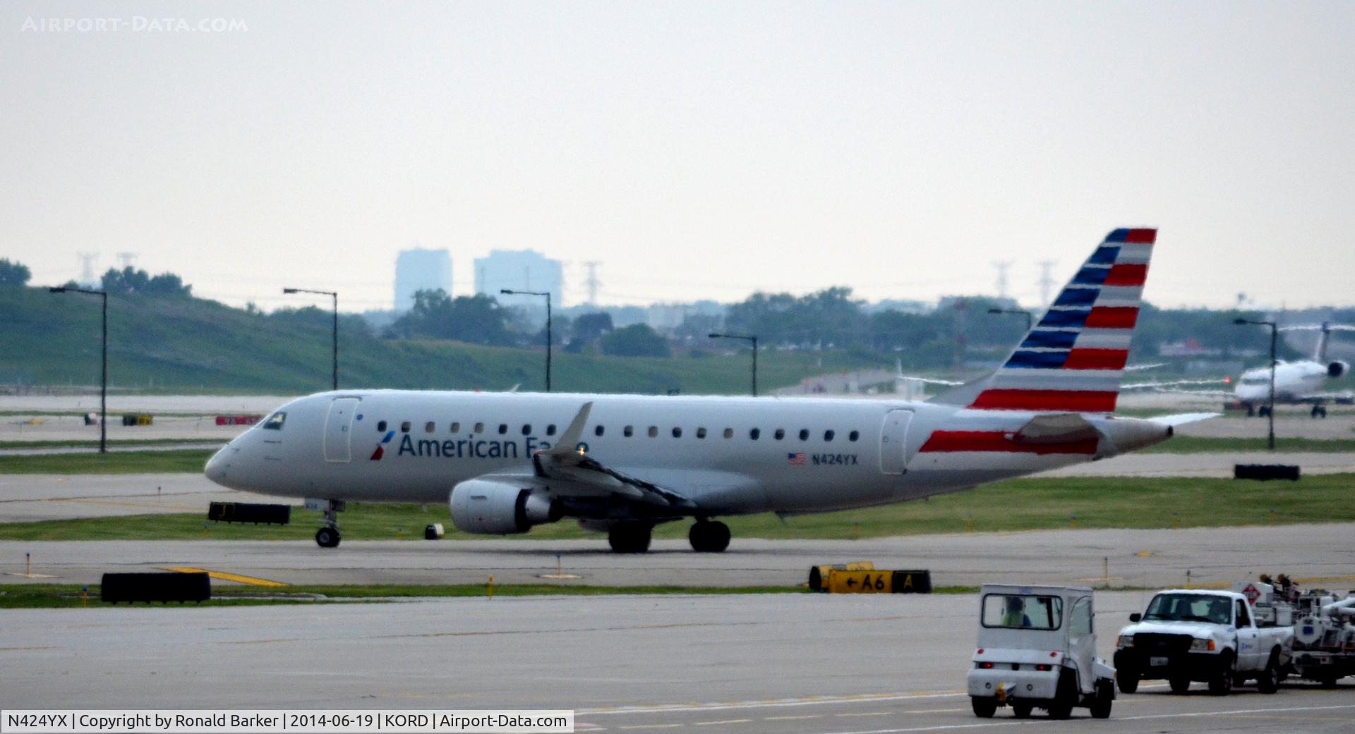 N424YX, 2014 Embraer 175LR (ERJ-170-200LR) C/N 17000393, Taxi for takeoff O'Hare