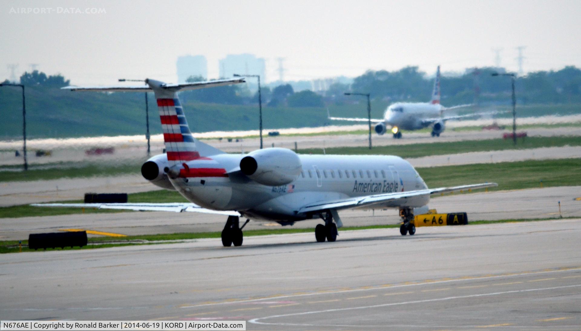 N676AE, 2004 Embraer ERJ-145LR (EMB-145LR) C/N 14500807, Taxi O'Hare