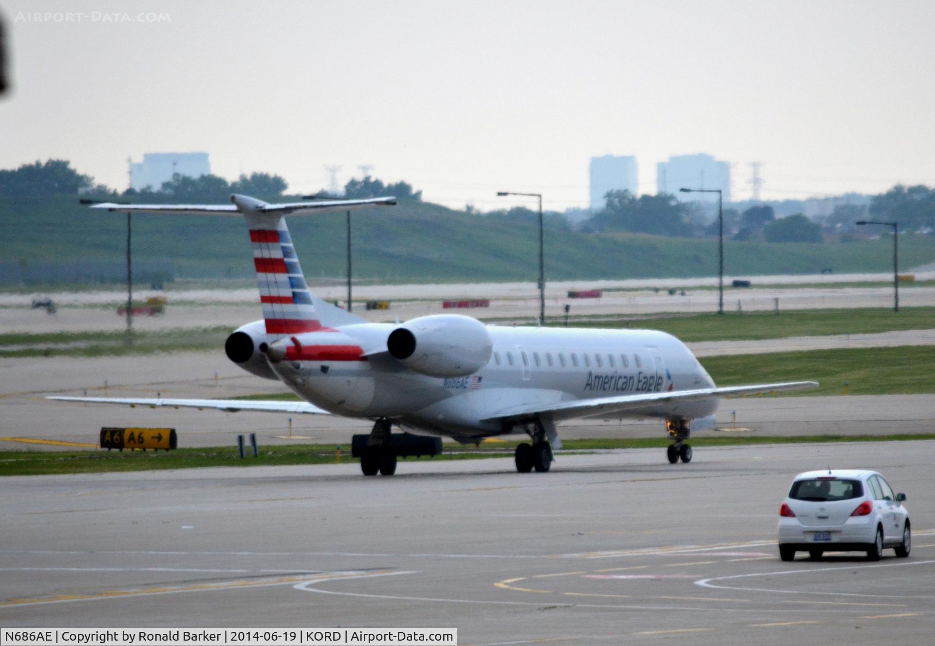 N686AE, 2004 Embraer ERJ-145LR (EMB-145LR) C/N 14500843, Taxi O'Hare