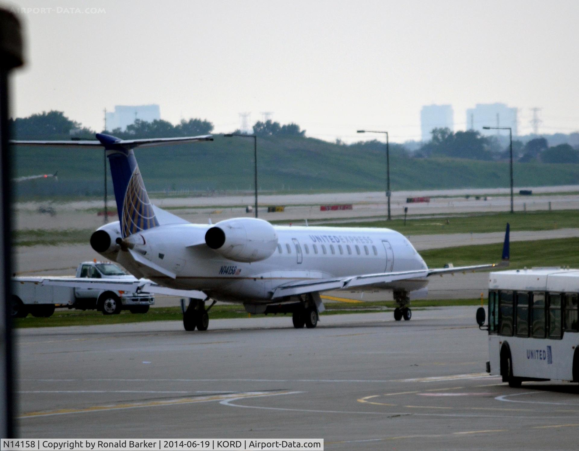 N14158, 2004 Embraer ERJ-145XR (EMB-145XR) C/N 145791, Taxi O'Hare