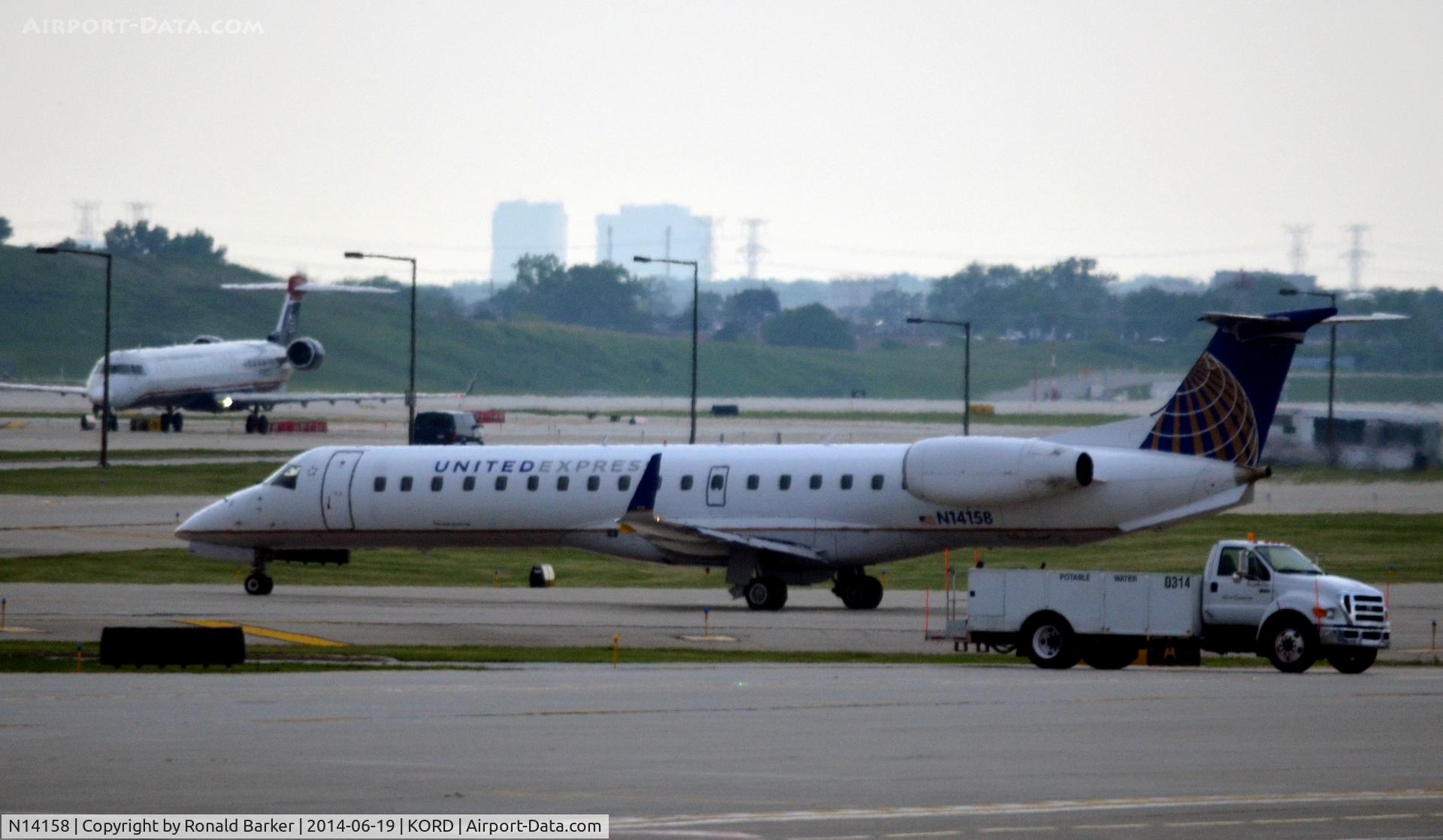 N14158, 2004 Embraer ERJ-145XR (EMB-145XR) C/N 145791, Taxi O'Hare