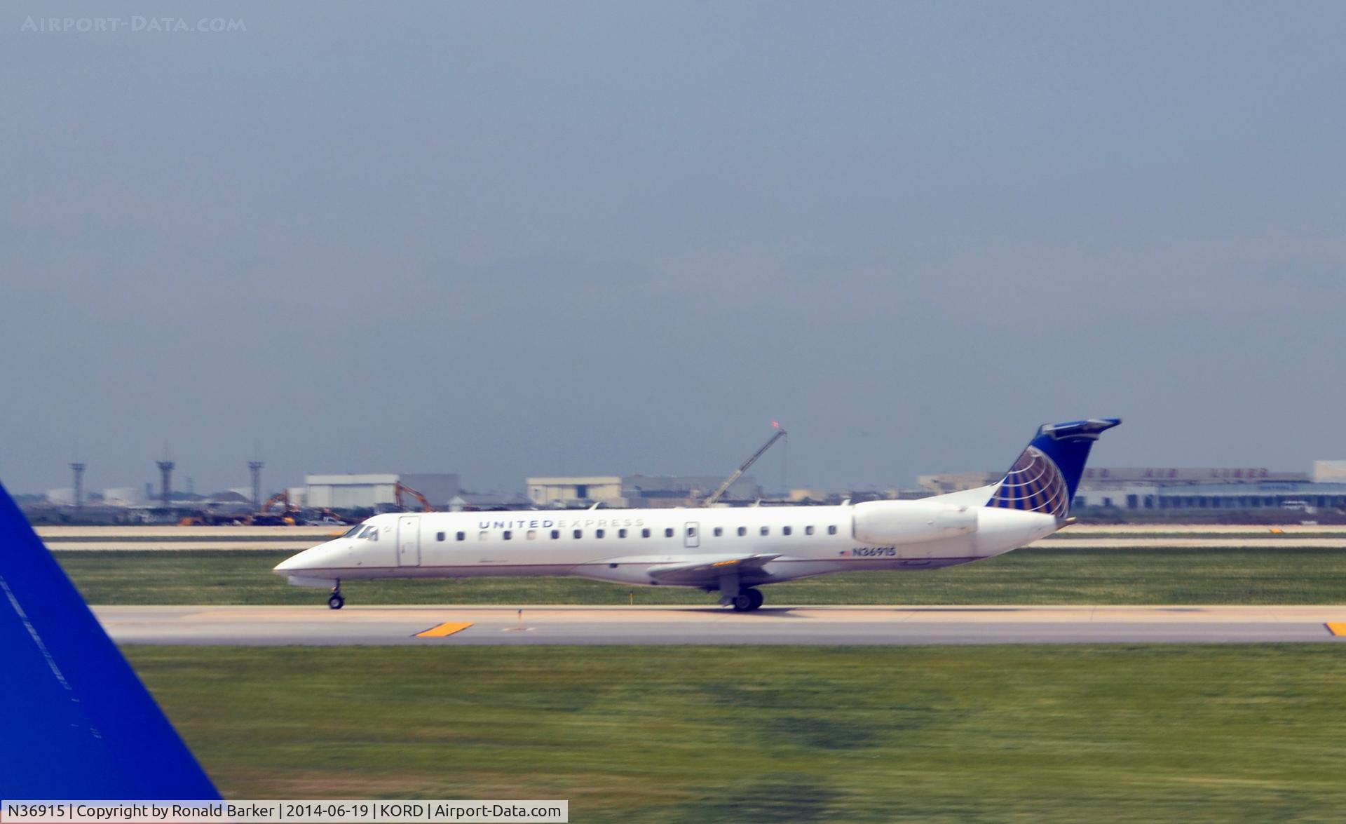 N36915, 2001 Embraer ERJ-145LR (EMB-145LR) C/N 145421, Taxi O'Hare