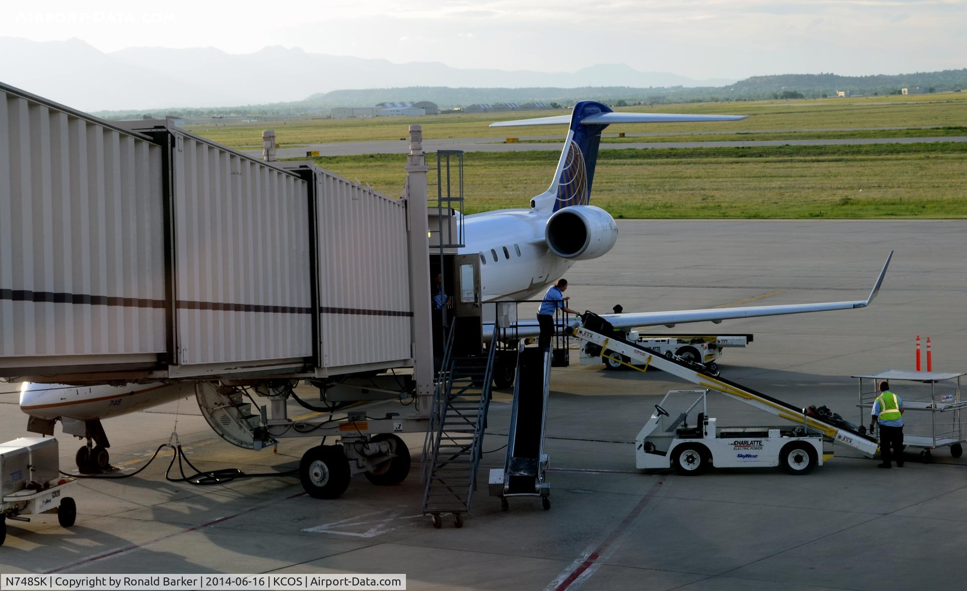 N748SK, 2005 Bombardier CRJ-700 (CL-600-2C10) Regional Jet C/N 10203, At the gate COS