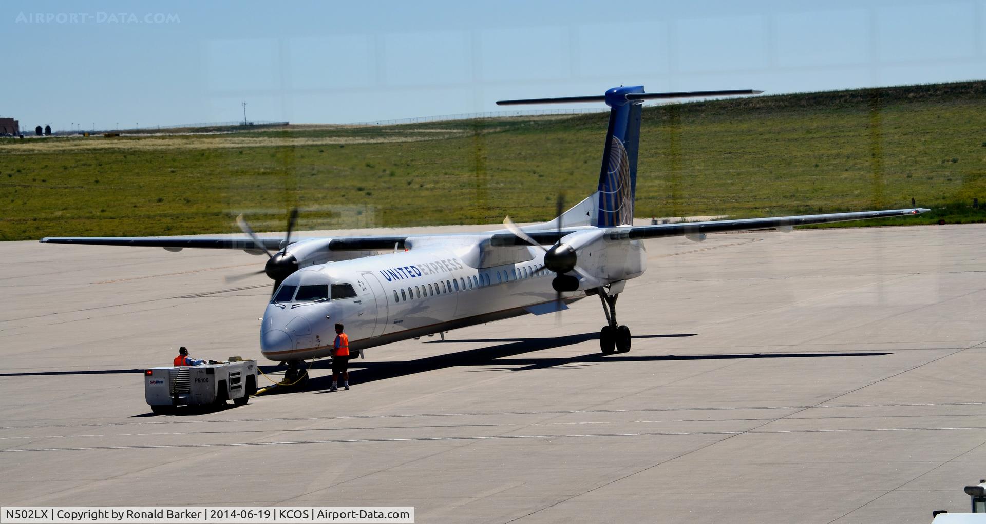 N502LX, 2007 Bombardier DHC-8-402 Dash 8 C/N 4168, Pushback from Gate COS
