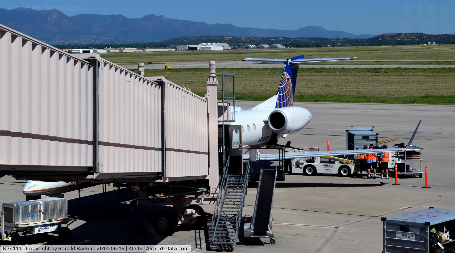 N34111, 2002 Embraer ERJ-145XR (EMB-145XR) C/N 145659, At the gate COS