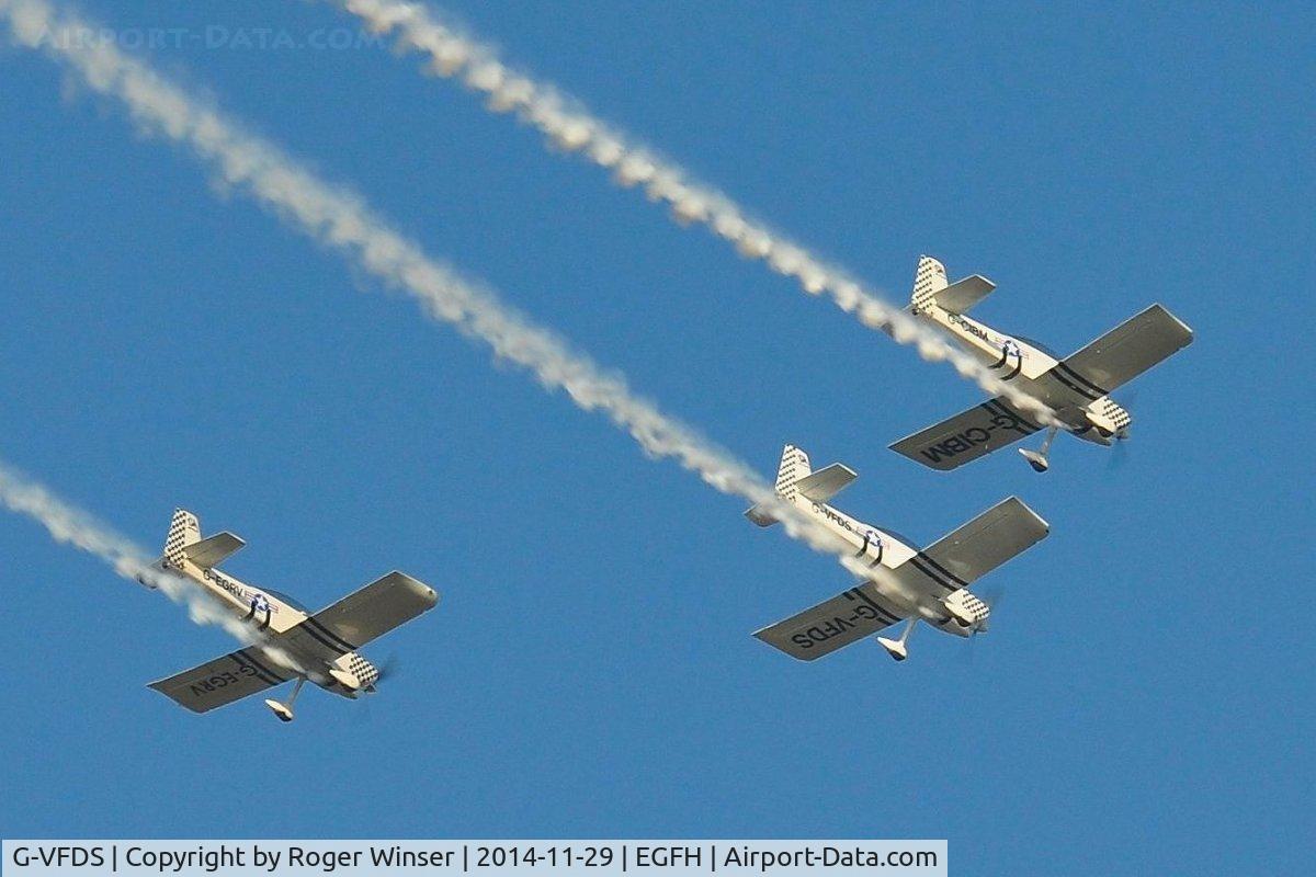 G-VFDS, 2012 Vans RV-8 C/N PFA 303-14637, Three-ship formation aerobatics practice by Team Raven. G-VFDS leads G-CIBM and G-EGRV (in the number 3 slot) out of a loop prior to landing.