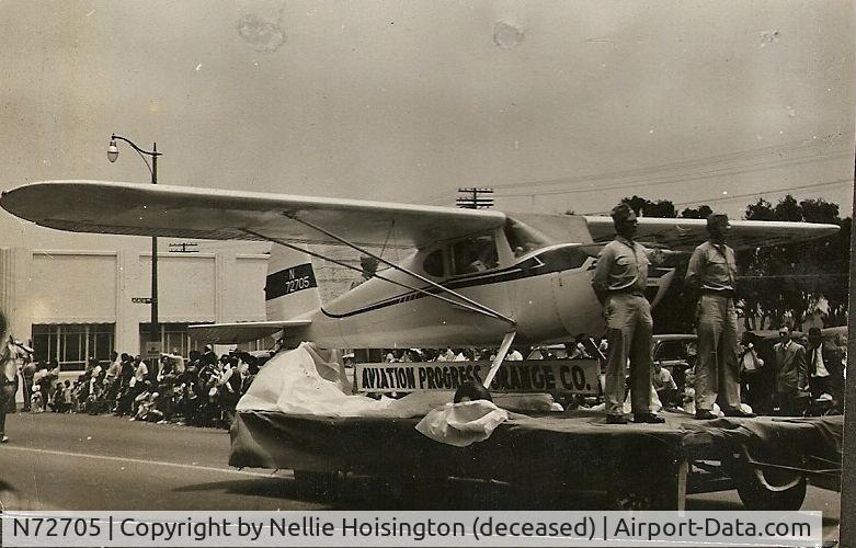 N72705, 1946 Cessna 140 C/N 9884, Photo taken in late 1940's in a 4th of July parade in Huntington Beach, California by my mother.
Dave Hoisington