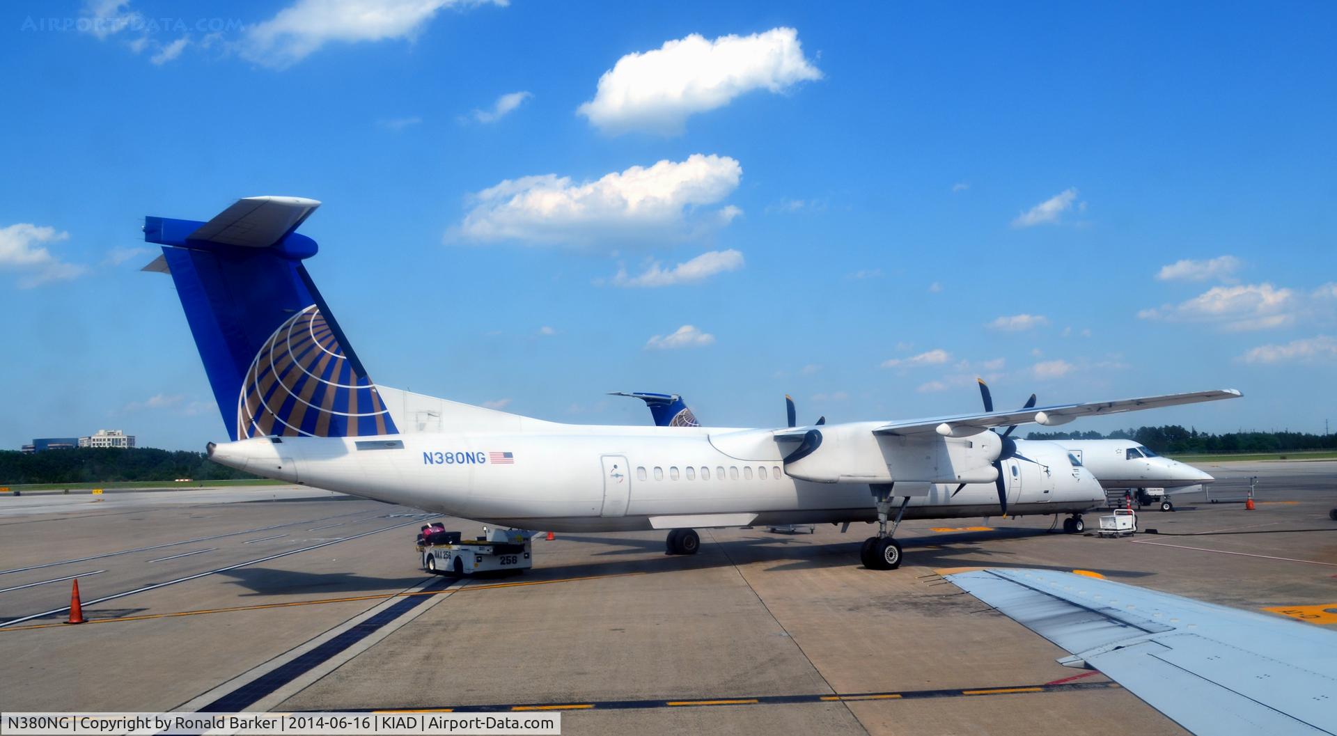 N380NG, 2011 Bombardier DHC-8-402 Dash 8 C/N 4380, At the gate IAD