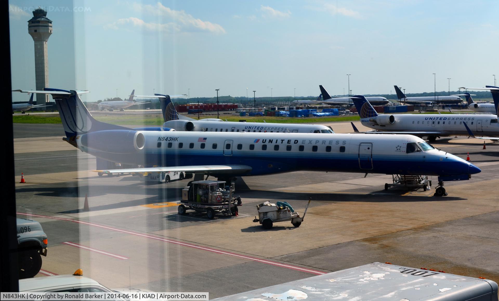 N843HK, 2004 Embraer EMB-145LR C/N 14500822, At the gate IAD