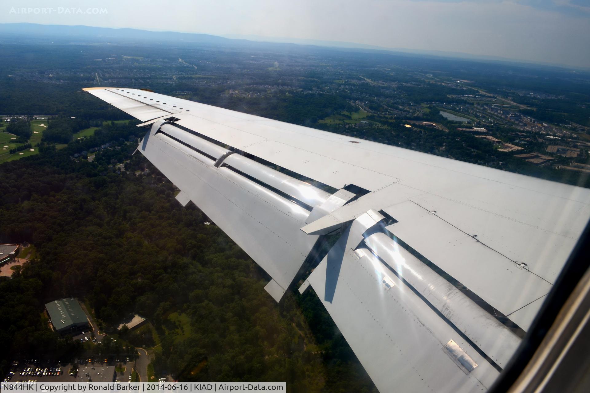 N844HK, 2004 Embraer ERJ-145LR (EMB-145LR) C/N 14500838, Flaps down landing at Dulles