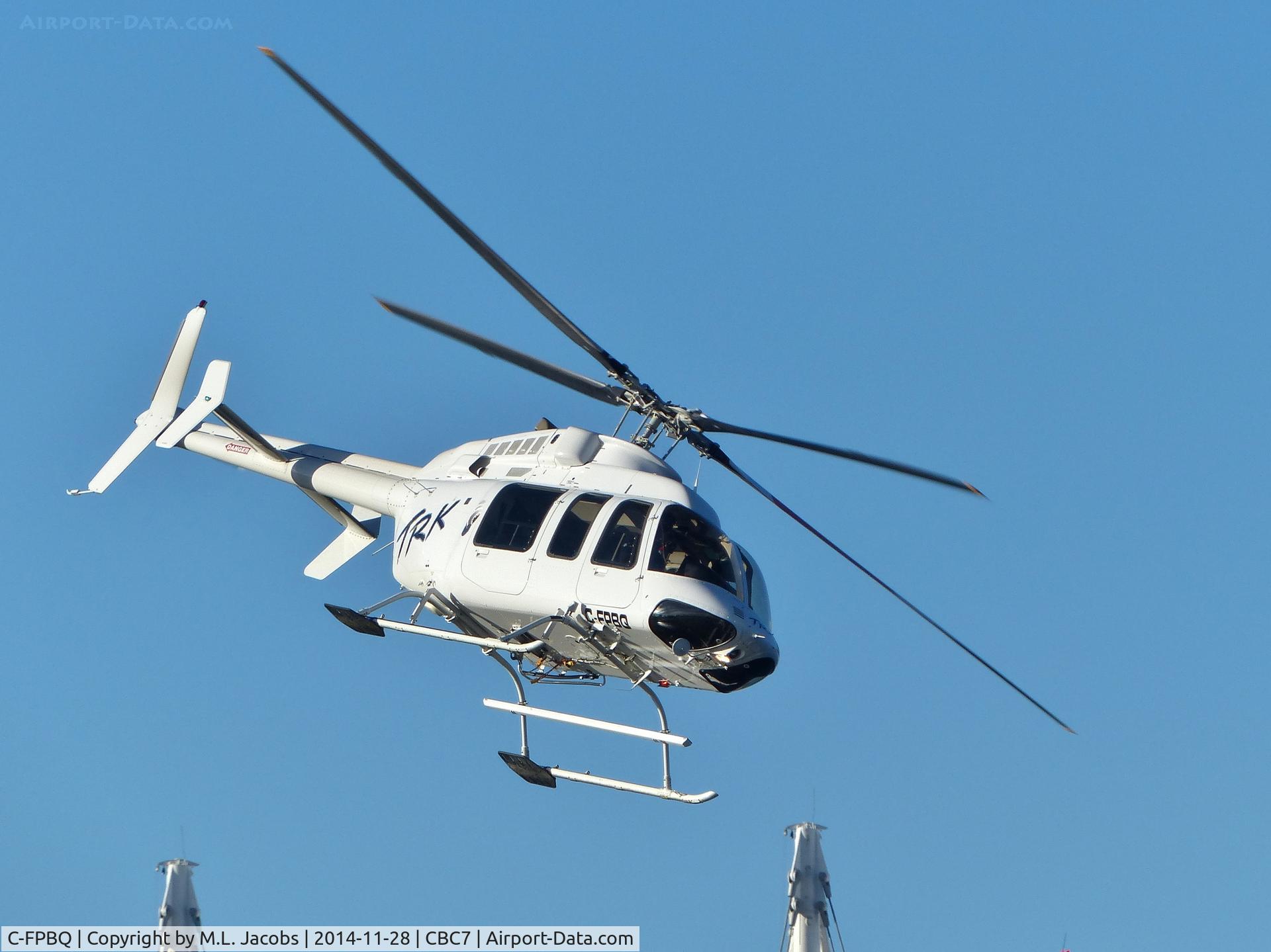 C-FPBQ, 1996 Bell 407 C/N 53042, TRK Helicopters Bell 407 about to land at Vancouver Harbour Heliport.