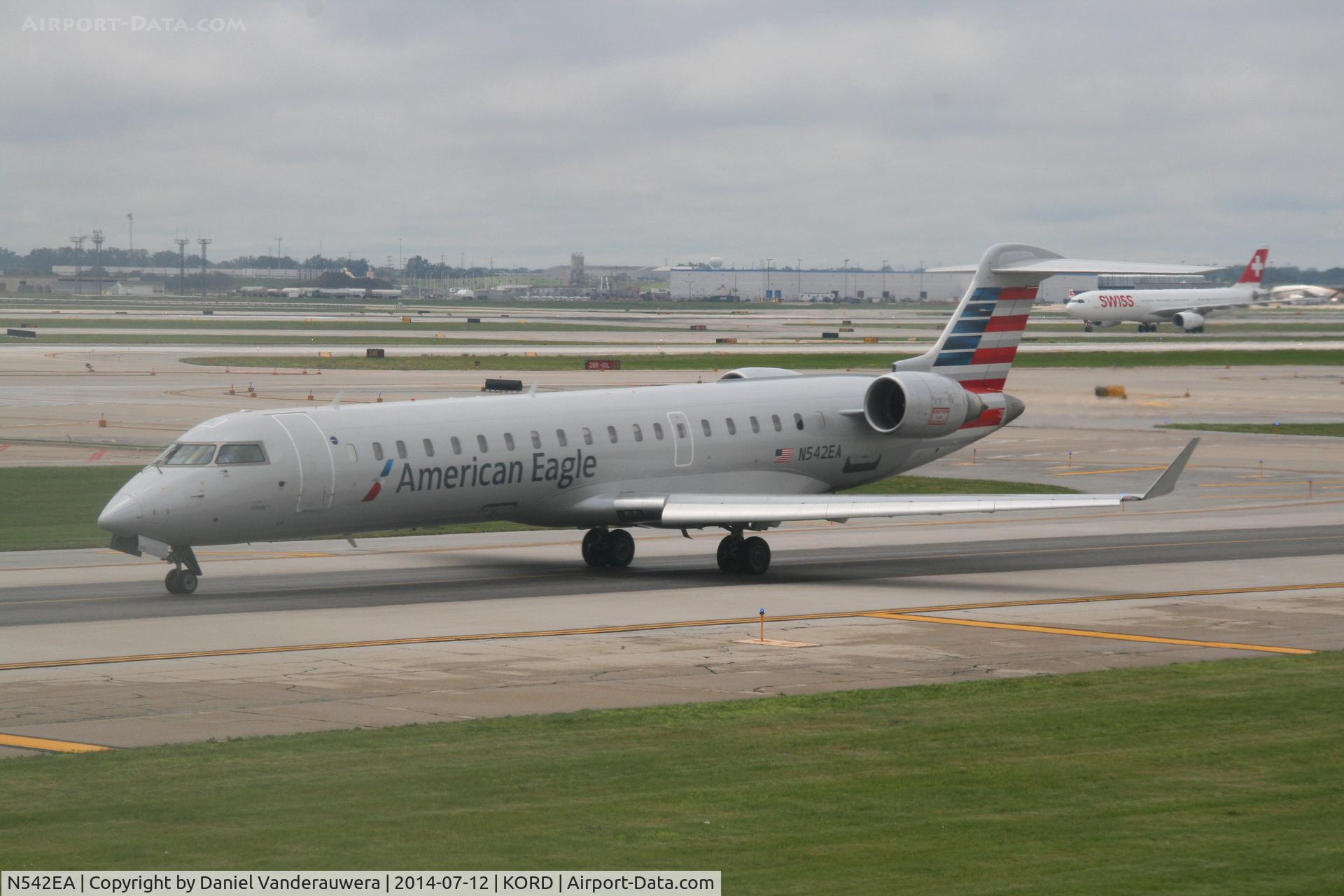 N542EA, Bombardier CRJ-702 (CL-600-2C10) Regional Jet C/N 10321, Taxiing on runway