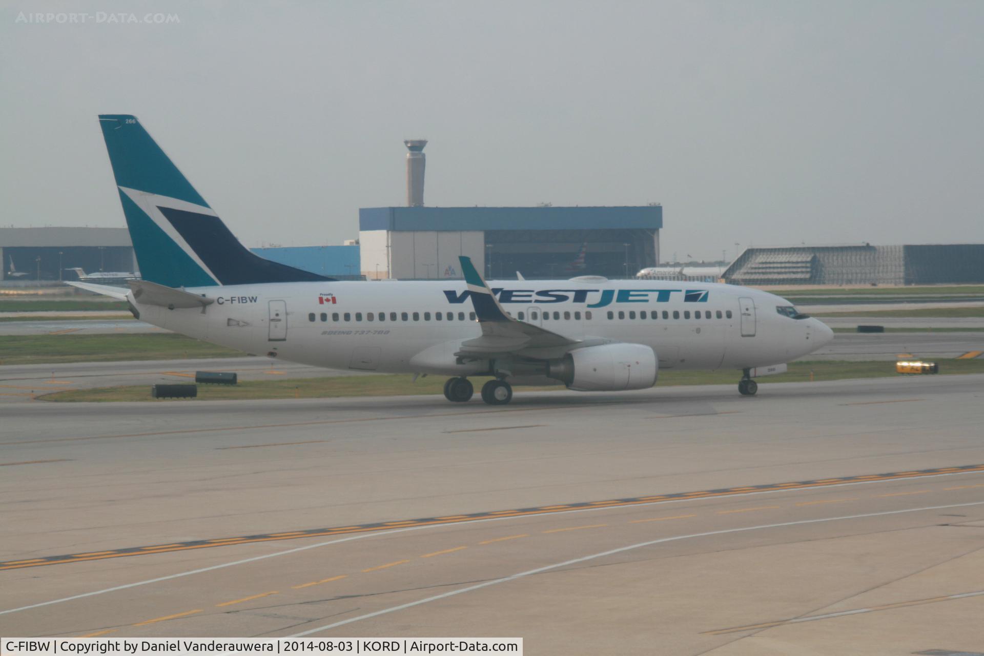 C-FIBW, 2011 Boeing 737-7CT C/N 37956, Taxiing to gate
