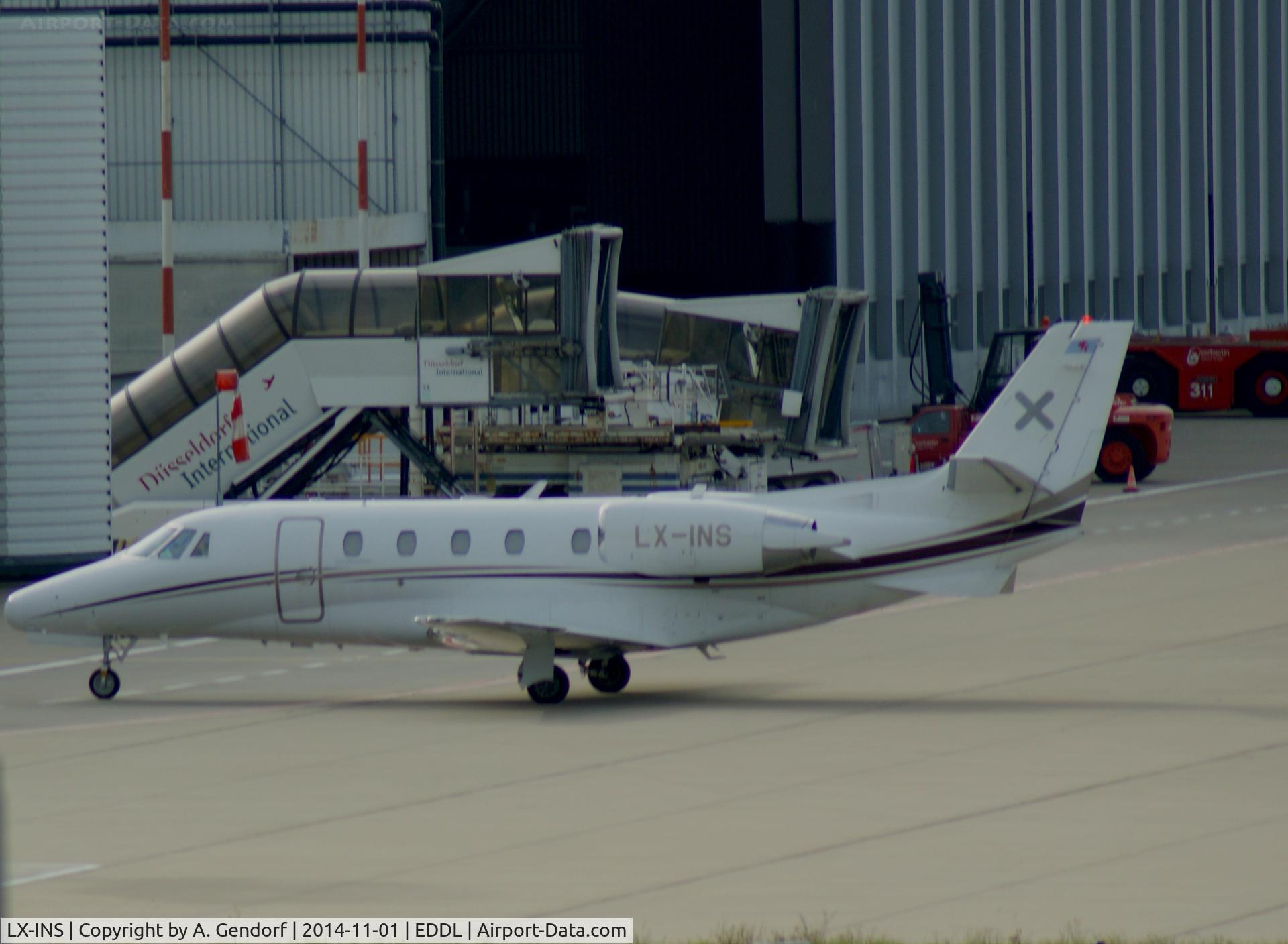 LX-INS, 2007 Cessna 560 Citation Excel C/N 560-5727, Luxaviation (untitled), is here rolling into the turbine test hangar at Düsseldorf Int'l(EDDL)
