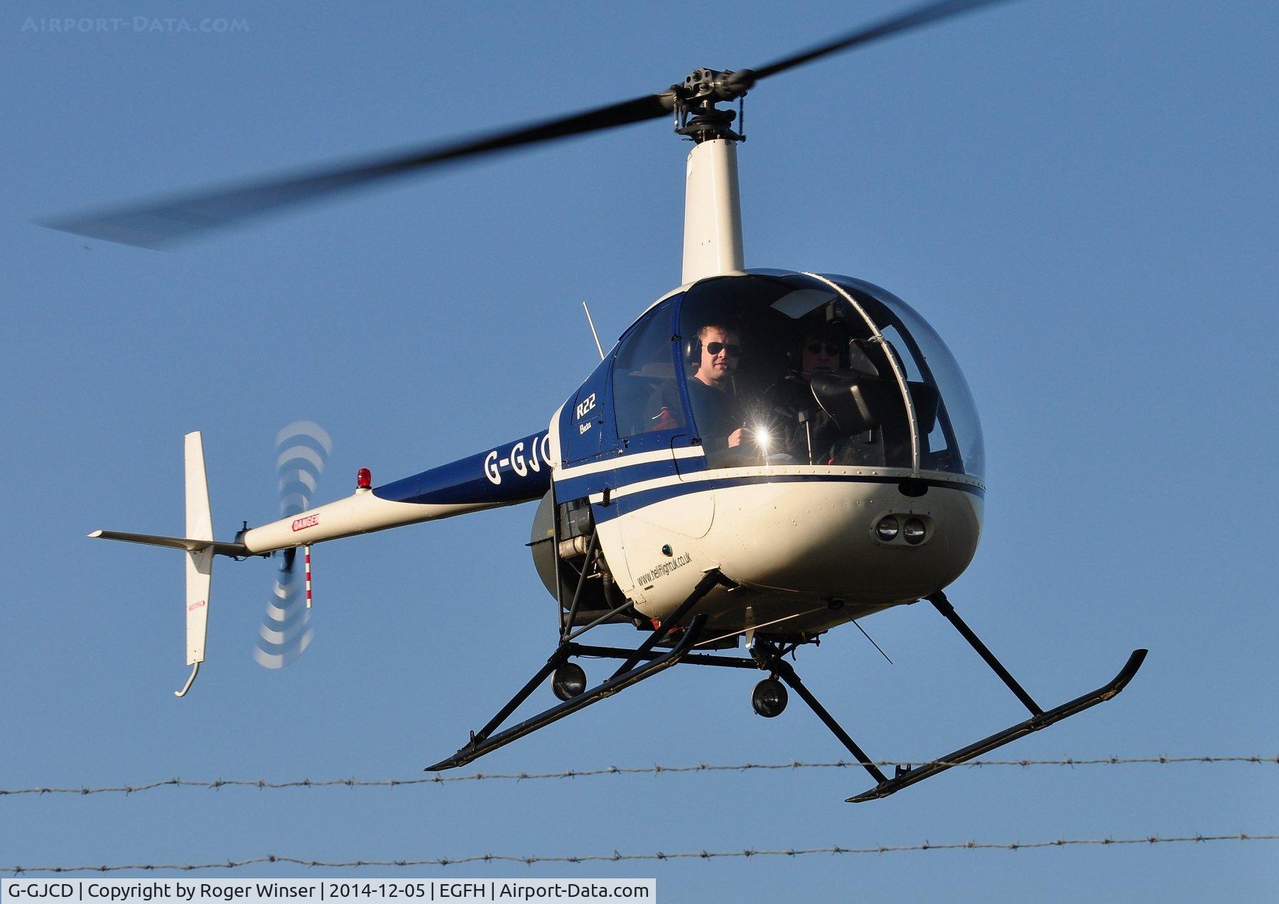 G-GJCD, 1989 Robinson R22 Beta C/N 0966, HeliAir's R-22 Beta helicopter operating from Swansea Airport.