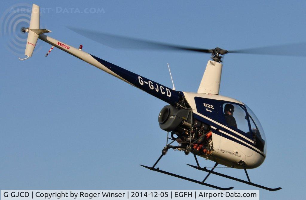 G-GJCD, 1989 Robinson R22 Beta C/N 0966, HeliAir's R-22 helicopter operating from Swansea Airport.