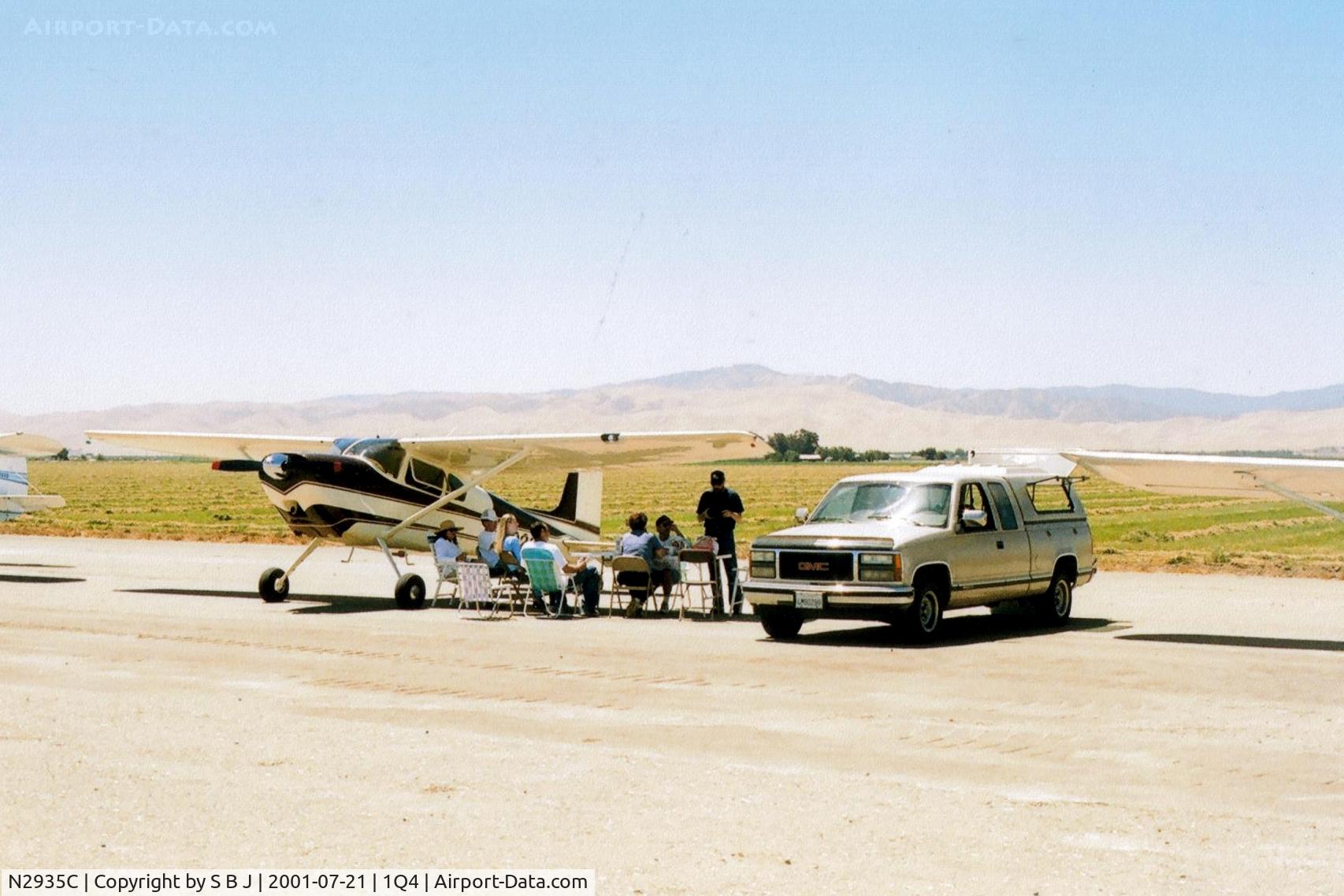 N2935C, 1954 Cessna 180 C/N 30835, 35C with its extra high wing, made this kind of activity a little more pleasant. This little mini flyin was at the New Jerusalem airport.Entertainment was a R22 helicopter (no injury) crash.