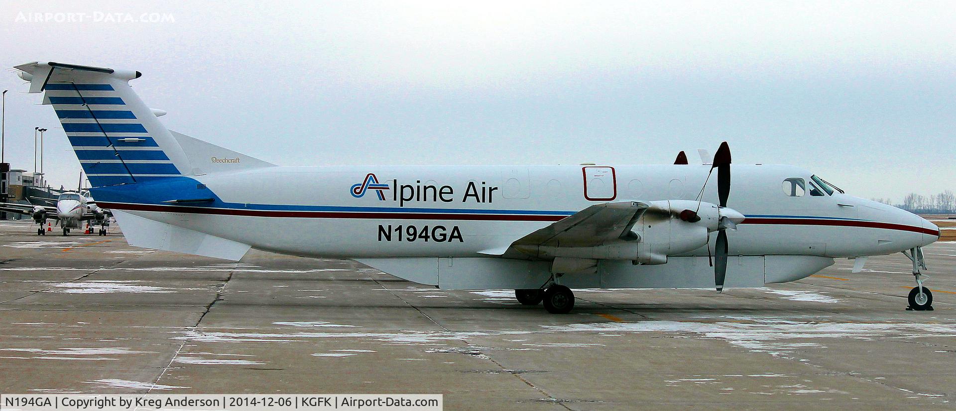 N194GA, 1984 Beech 1900C C/N UB-8, Beech 1900C of Alpine Air on the ramp in Grand Forks, ND.