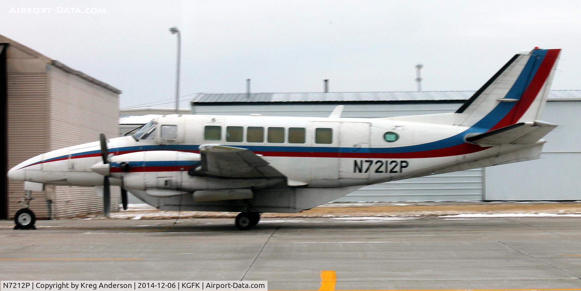 N7212P, 1984 Beech C99 Airliner C/N U-220, Beech C99 of Bemidji Aviation Services on the ramp in Grand Forks, ND. Sory for the blur.