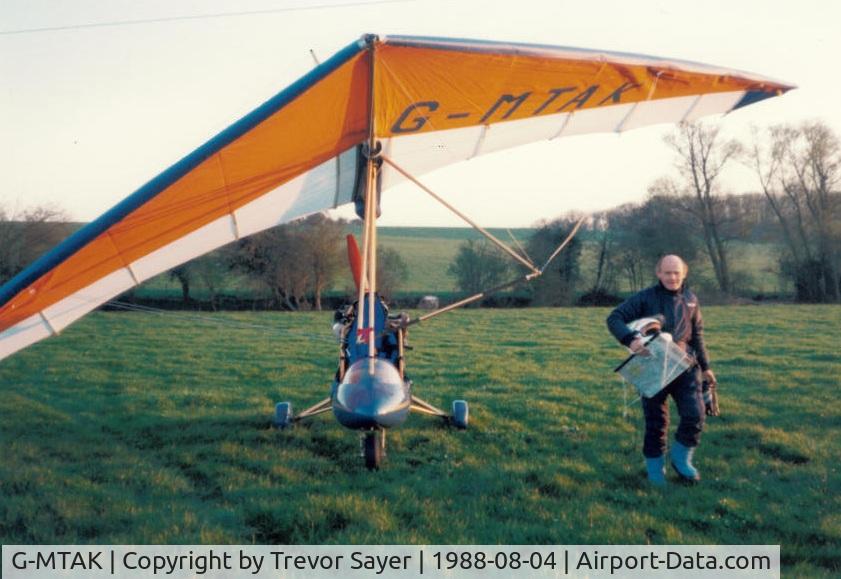 G-MTAK, 1986 Solar Wings PEGASUS XL-R C/N SW-WA-1105, Trevor Sayer with Solar Wings XL Trike G-MTAK -  flying from a field near Poole Dorset 1988
