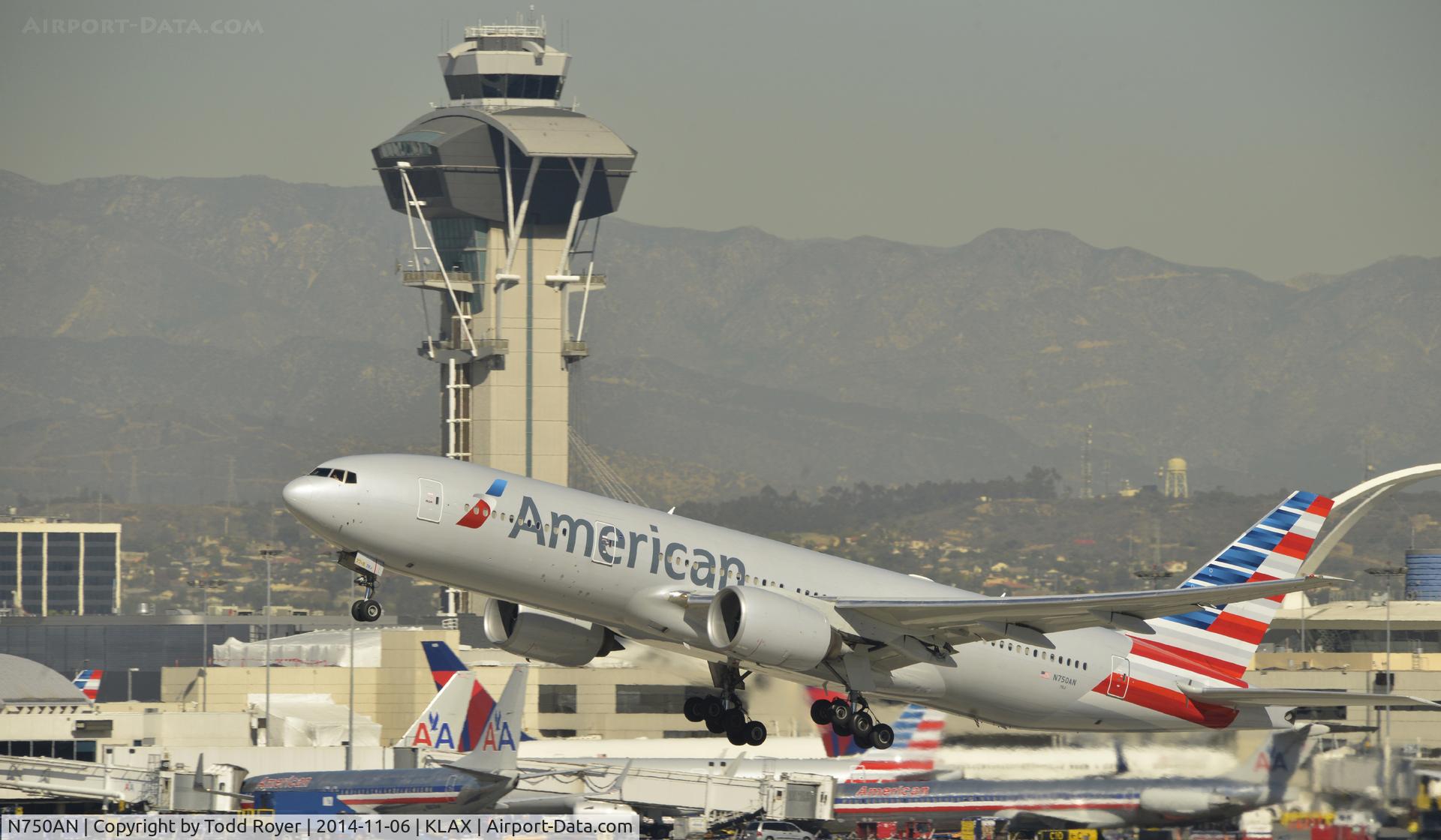 N750AN, 2001 Boeing 777-223 C/N 30259, Departing LAX on 25R