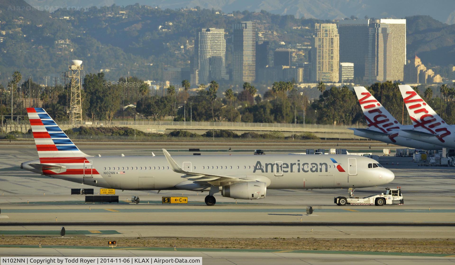 N102NN, 2013 Airbus A321-231 C/N 5860, Getting towed to gate at LAX