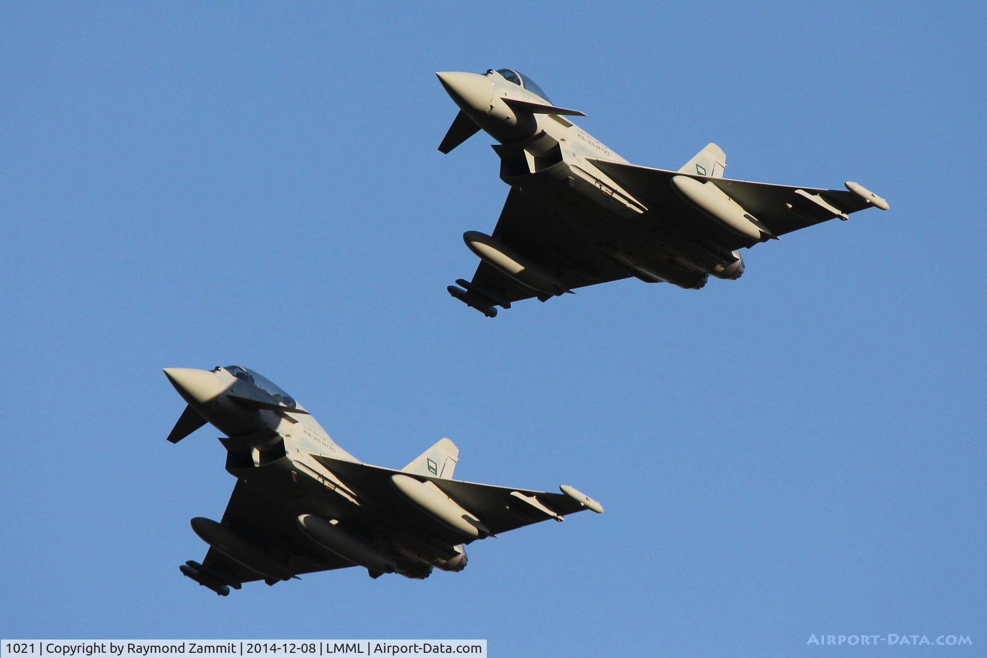 1021, 2014 Eurofighter EF-2000 Typhoon T C/N ???/CT018, Eurofighters 1021 & 1023 of Royal Saudi Air Force in for a run in and break over Malta during delivery flight from UK to Saudi Arabia.