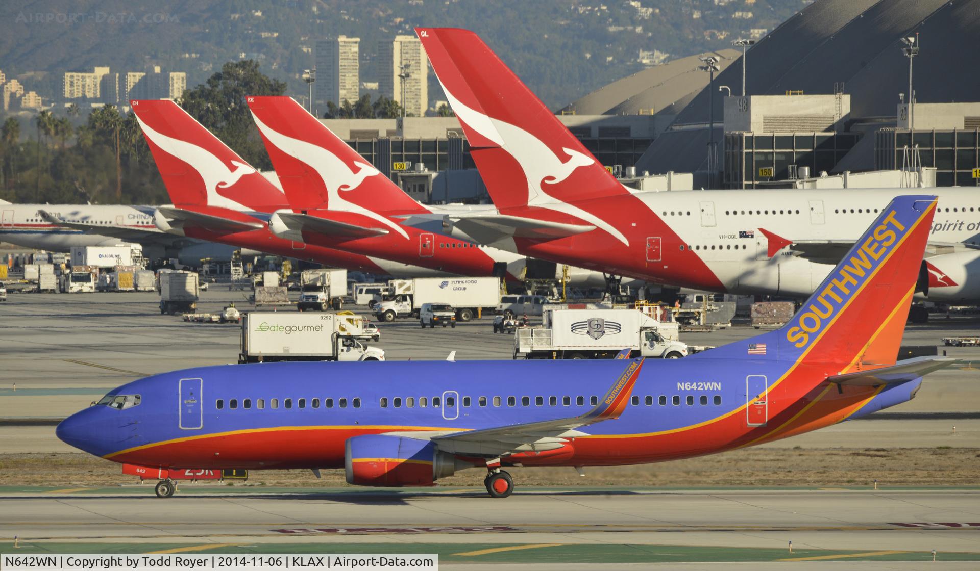 N642WN, 1997 Boeing 737-3H4 C/N 27715, Taxiing to gate after landing on 25L at LAX