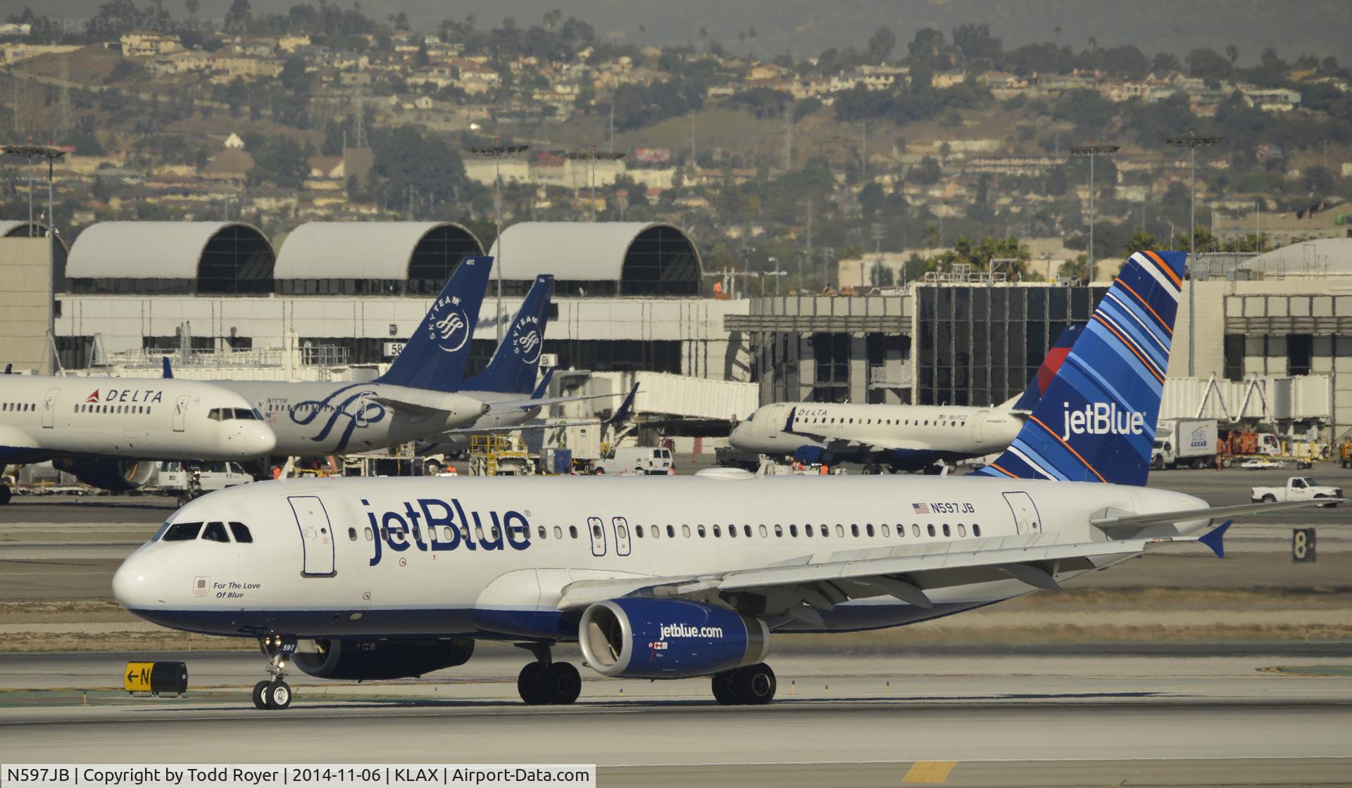 N597JB, 2004 Airbus A320-232 C/N 2307, Landing on 25L at LAX