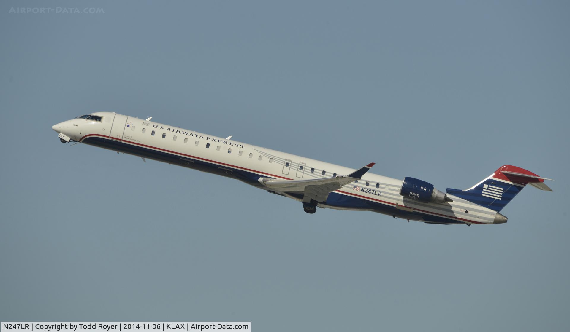 N247LR, 2011 Bombardier CRJ-900LR (CL-600-2D24) C/N 15273, Departing LAX on 24R