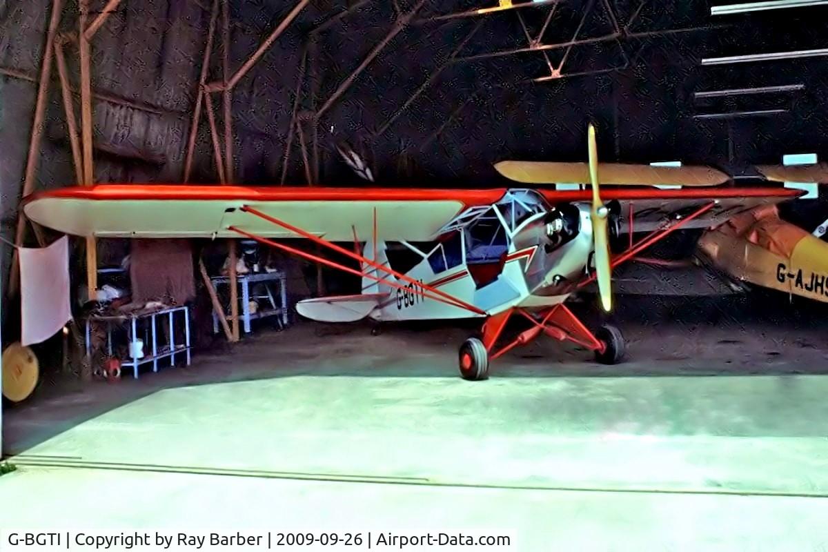 G-BGTI, 1944 Piper L-4J Grasshopper (J3C-65D) C/N 12940, Piper L-4J Grasshopper [12940] (Place and date unknown). From a slide.