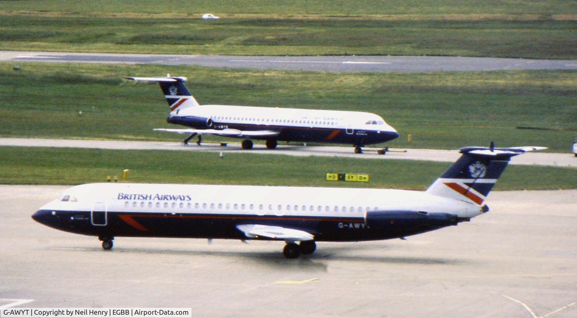 G-AWYT, 1969 BAC 111-501EX One-Eleven C/N BAC.176, Scanned from original slide taken at Birmingham, UK (BHX) in 1996.  The other aircraft is BAC-111 = G-AWYR