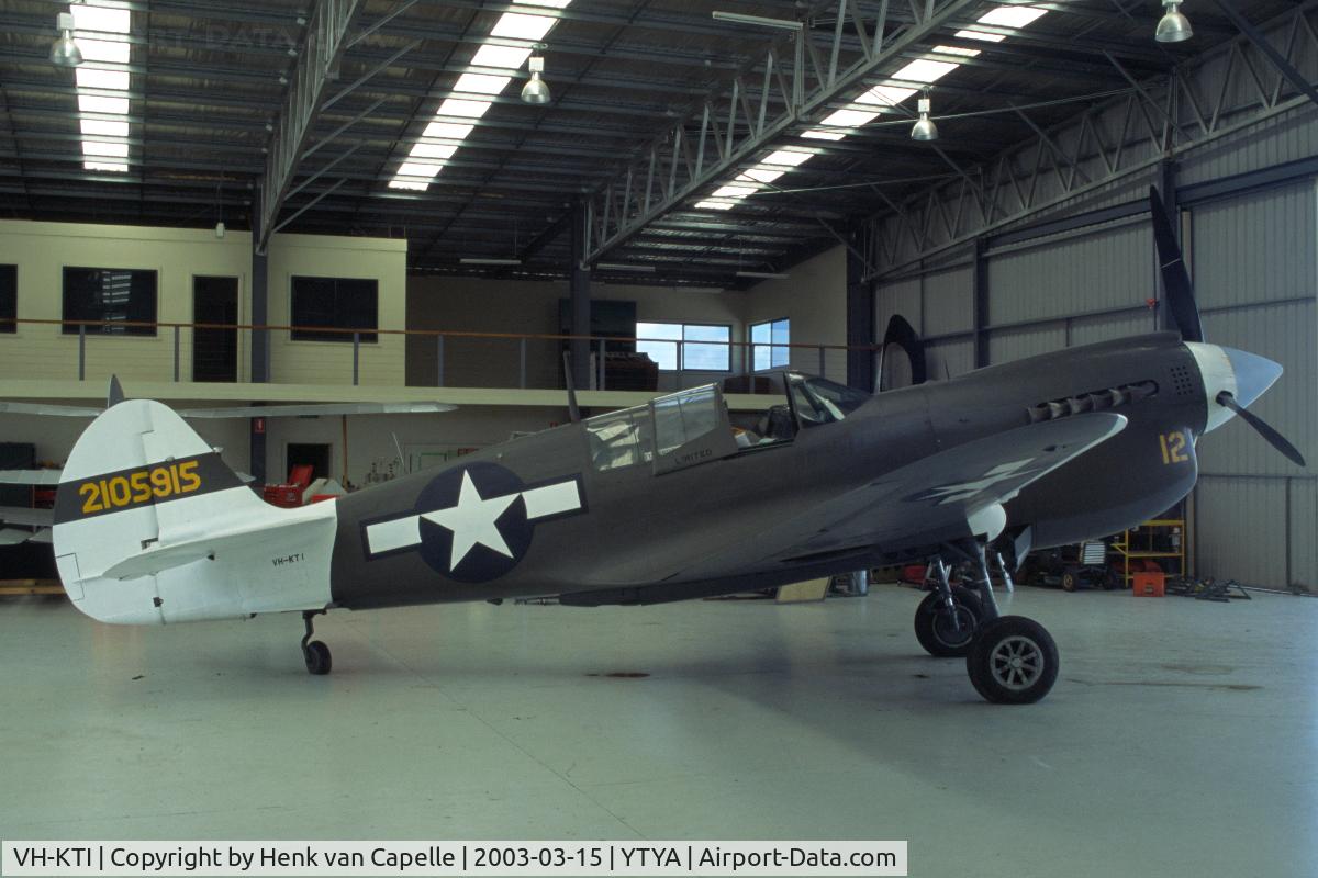 VH-KTI, 1942 Curtiss P-40N Warhawk C/N 29677, Curtiss P-40N Warhawk parked in a hangar at Tyabb airport, Victoria, Australia.