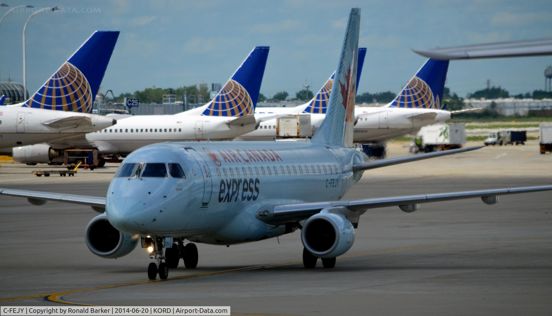 C-FEJY, 2005 Embraer 175SU (ERJ-170-200SU) C/N 17000097, Taxi to park O'Hare
