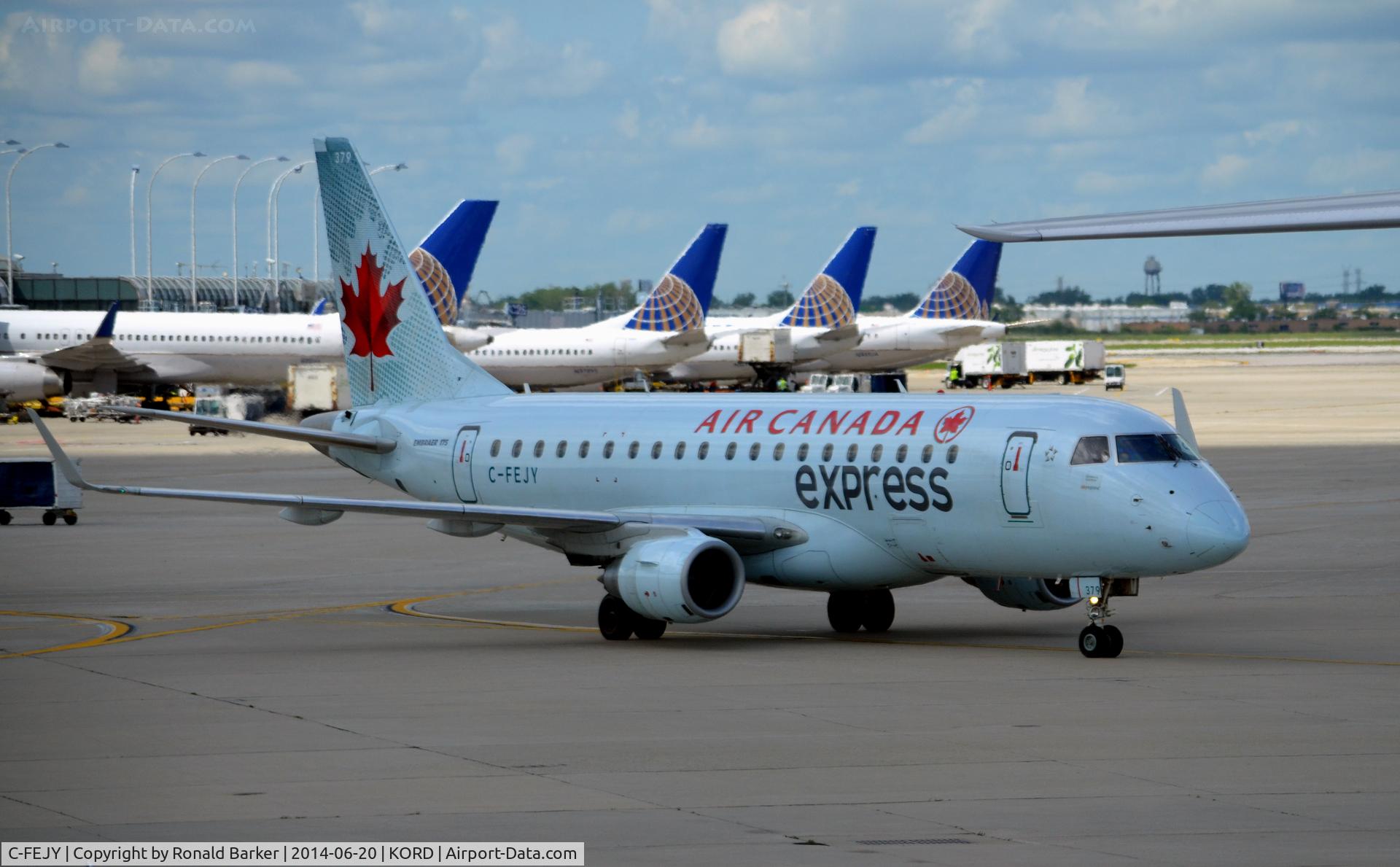 C-FEJY, 2005 Embraer 175SU (ERJ-170-200SU) C/N 17000097, Taxi to park O'Hare