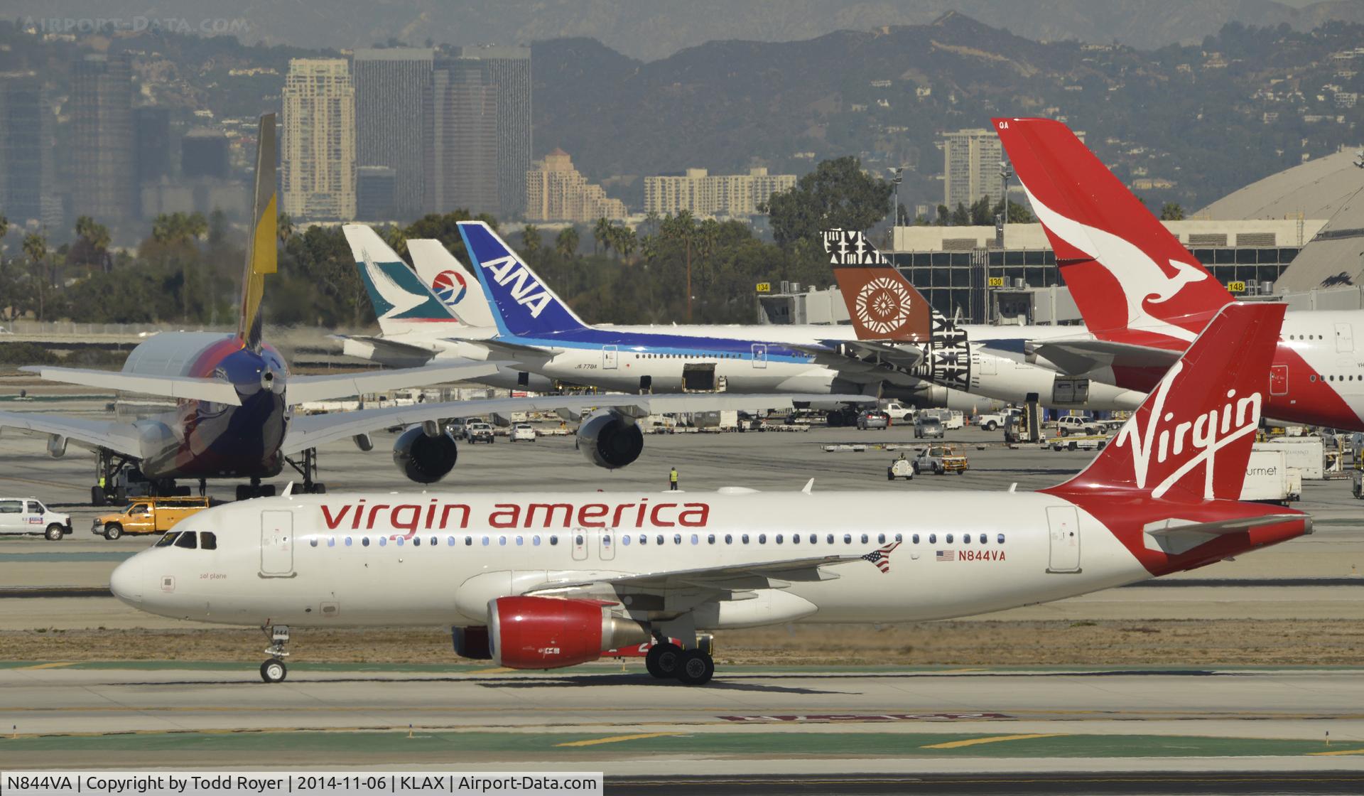 N844VA, Airbus A320-214 C/N 4851, Taxiing to parking after Landing on 25L