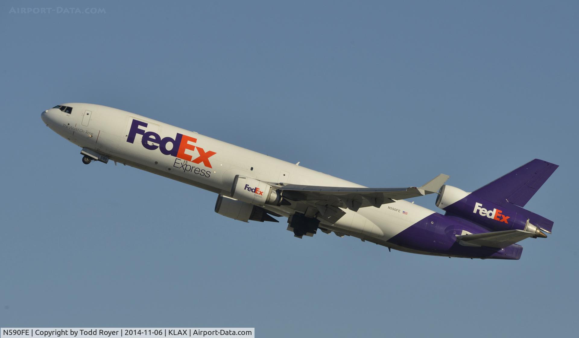 N590FE, 1991 McDonnell Douglas MD-11F C/N 48505, Departing LAX on 25R