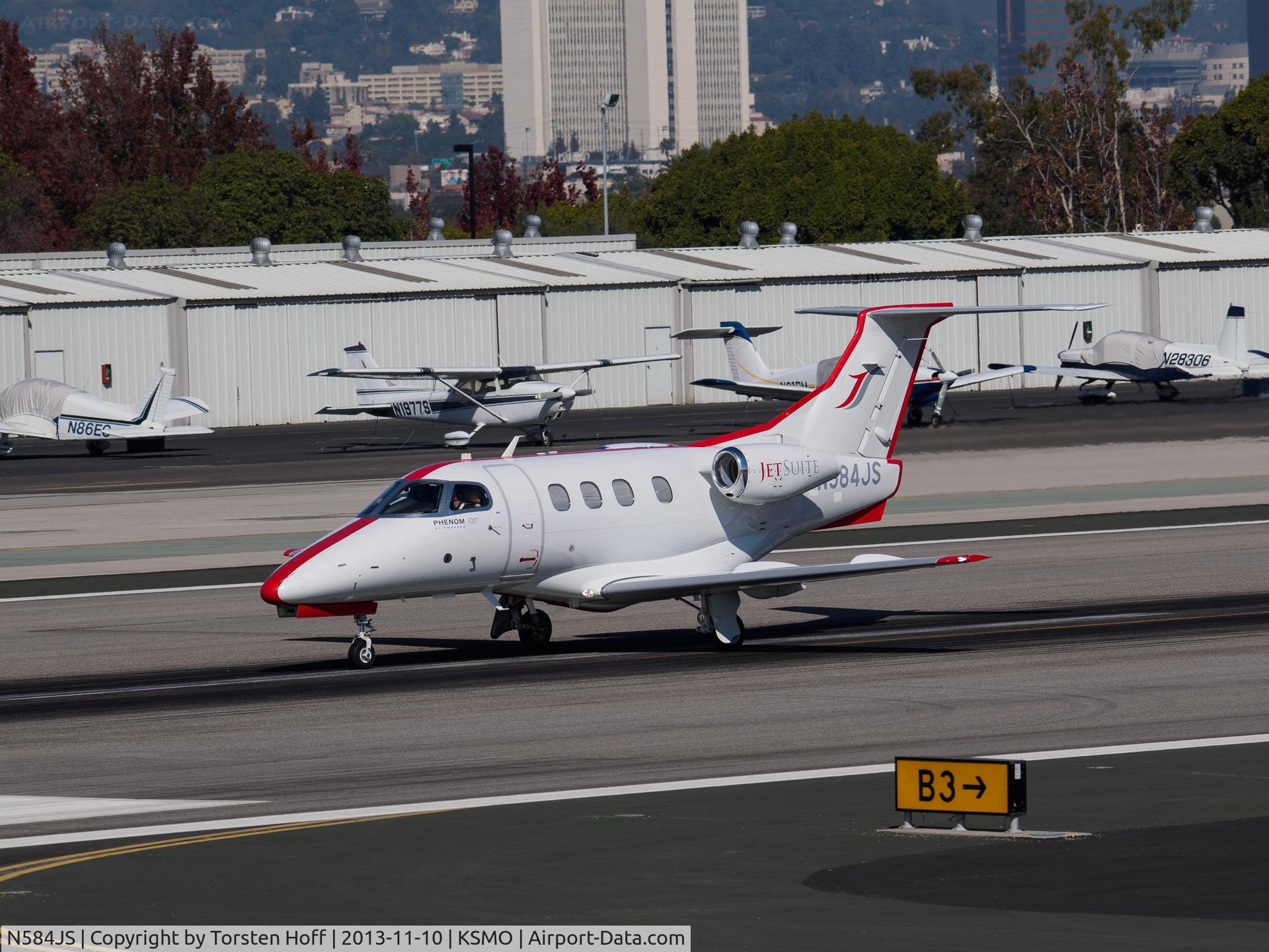 N584JS, 2010 Embraer EMB-500 Phenom 100 C/N 50000140, N584JS departing from RWY 21