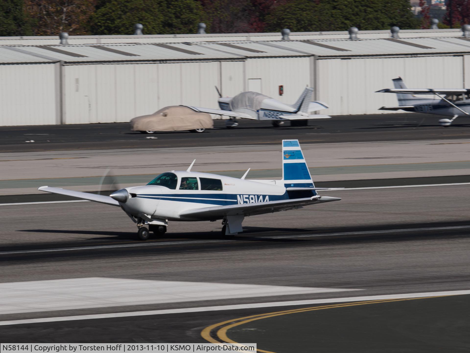N58144, 1985 Mooney M20J 201 C/N 24-1574, N58144 departing from RWY 21