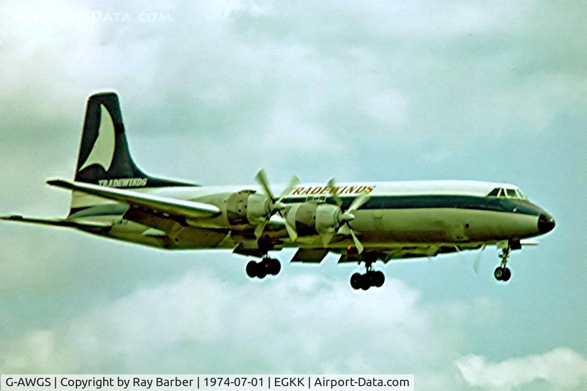 G-AWGS, 1961 Canadair CL-44D4-1 C/N 27, Canadair CL-44D4-1 [27] (Tradewinds) Gatwick~G 01/07/1974. From a slide.