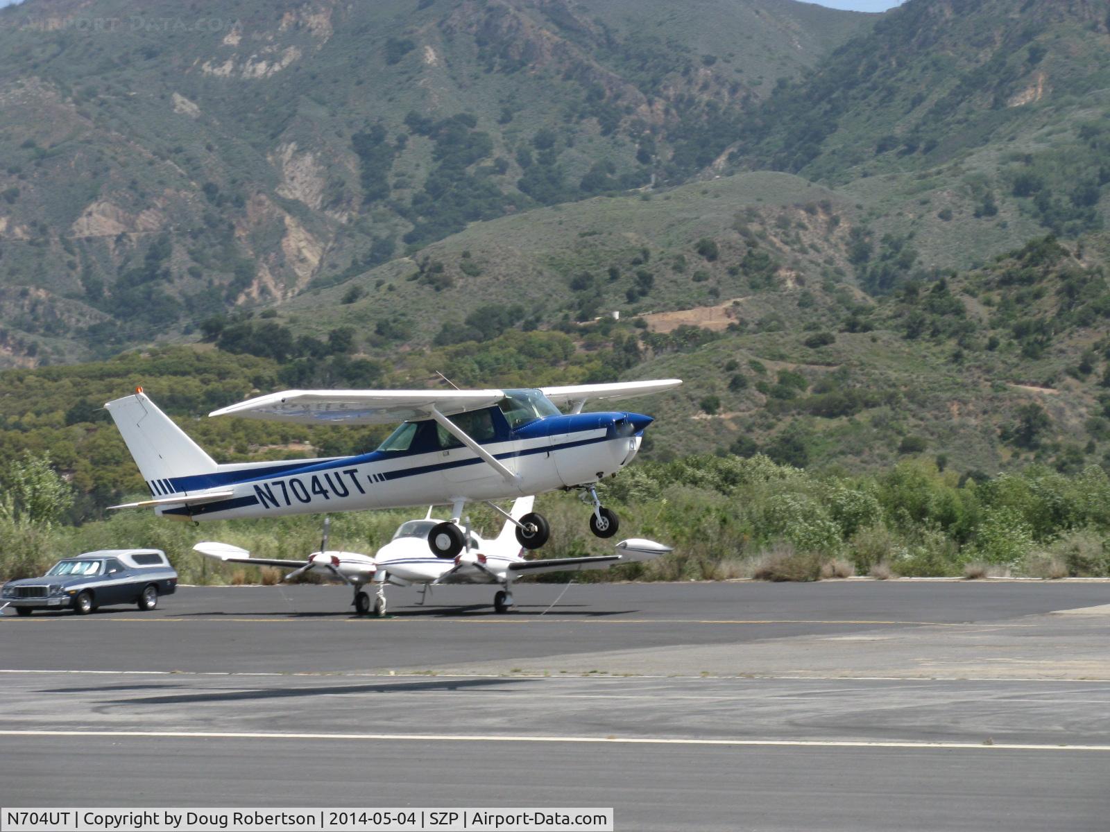 N704UT, 1976 Cessna 150M C/N 15078891, 1976 Cessna 150M, Continental O-200 100 Hp, takeoff climb Rwy 22